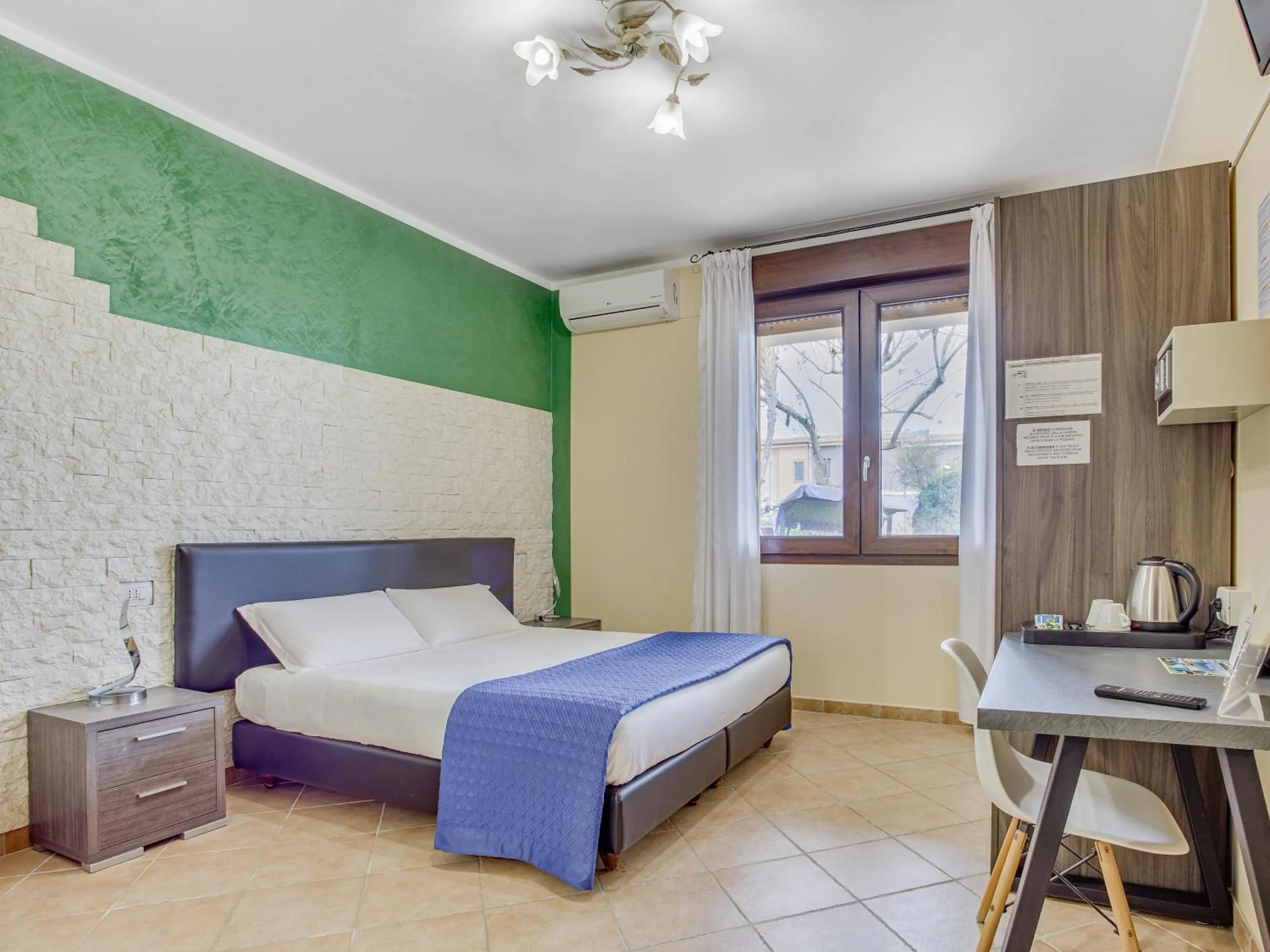 Bed in MEMO'S Affittacamere