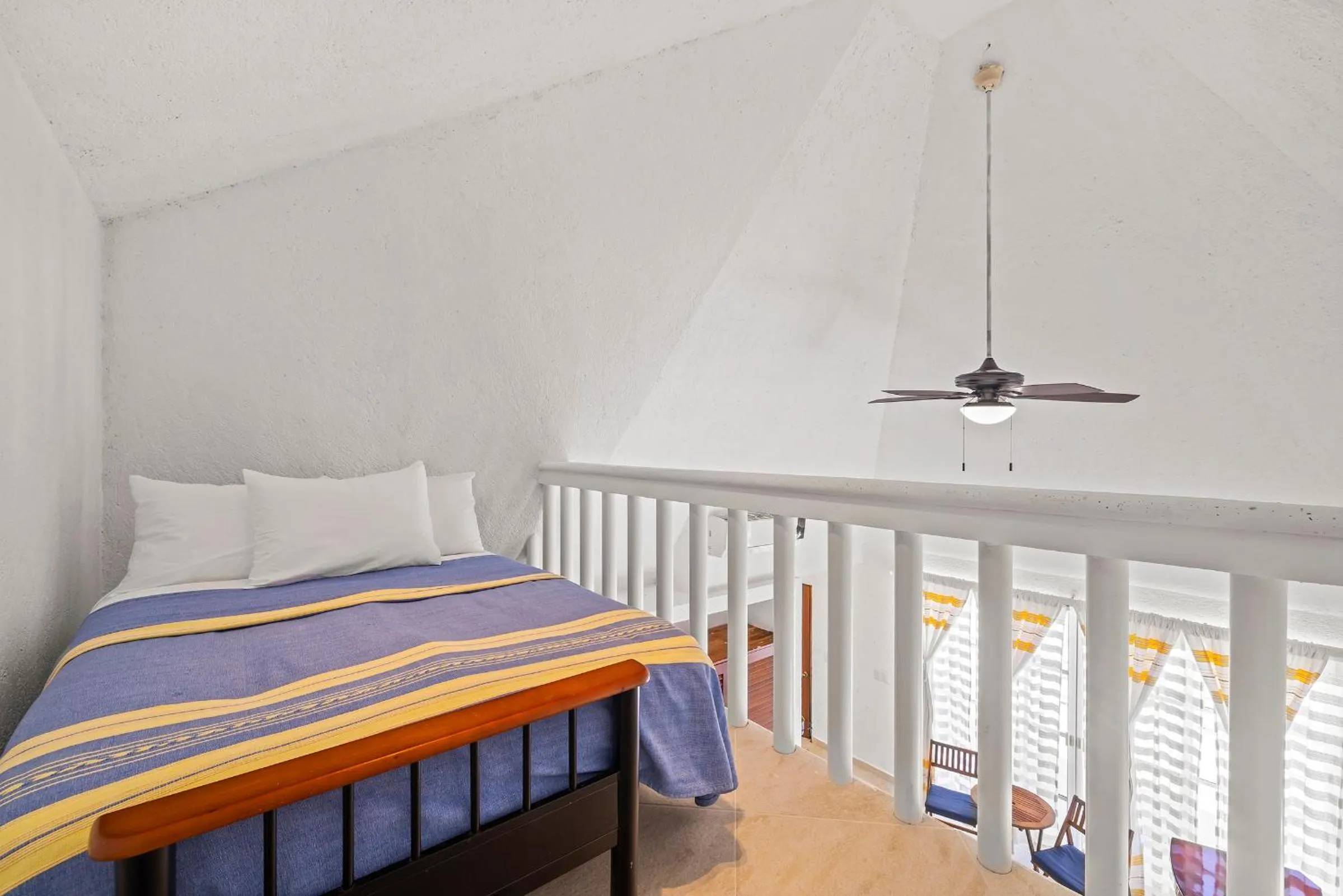 Bed in Casa Cenote Hotel