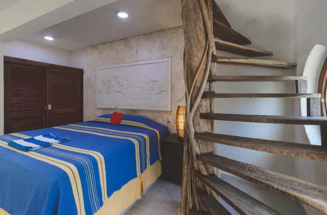 Inner courtyard view, Bed in Casa Cenote Hotel