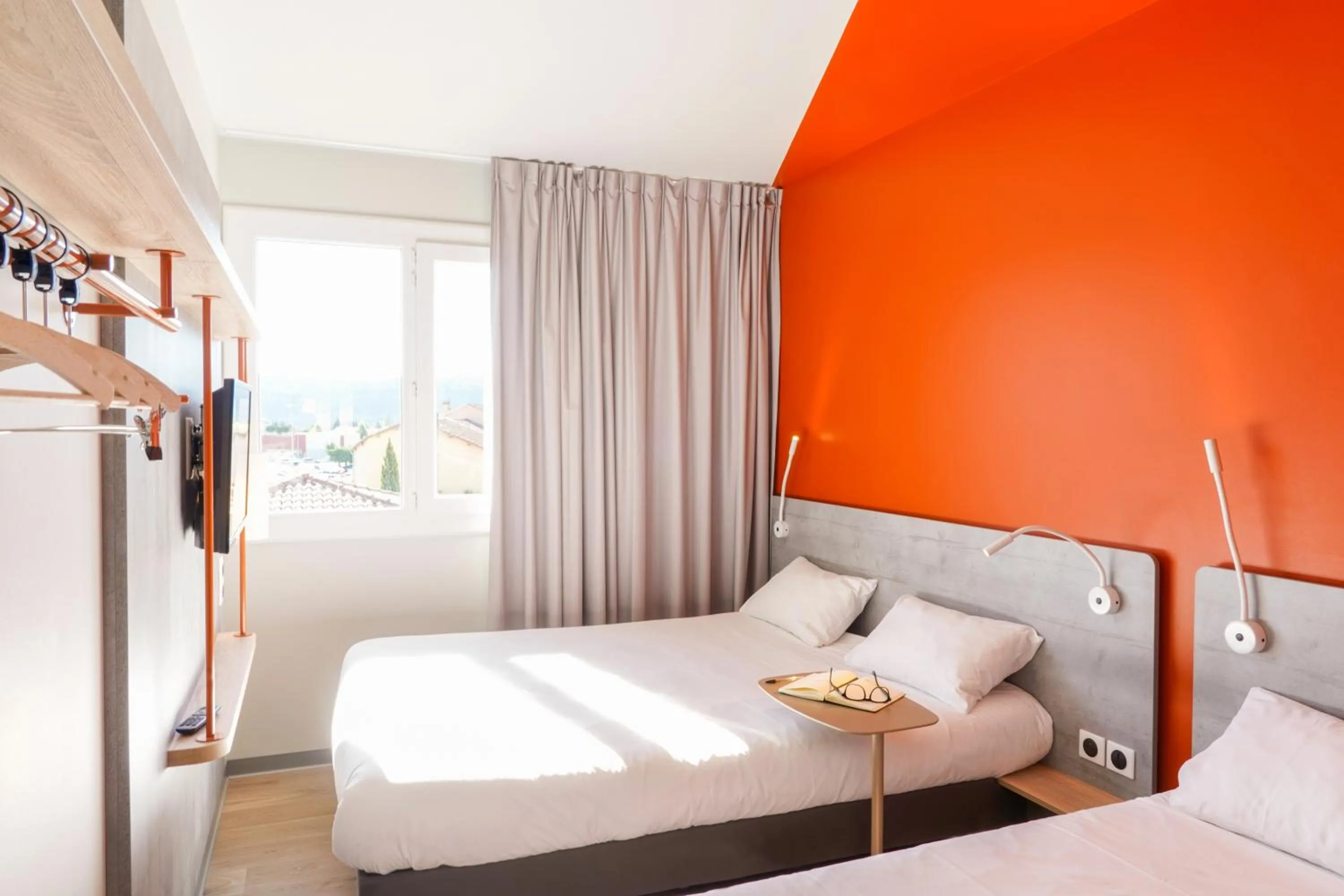 Bed in Ibis Budget Aubenas