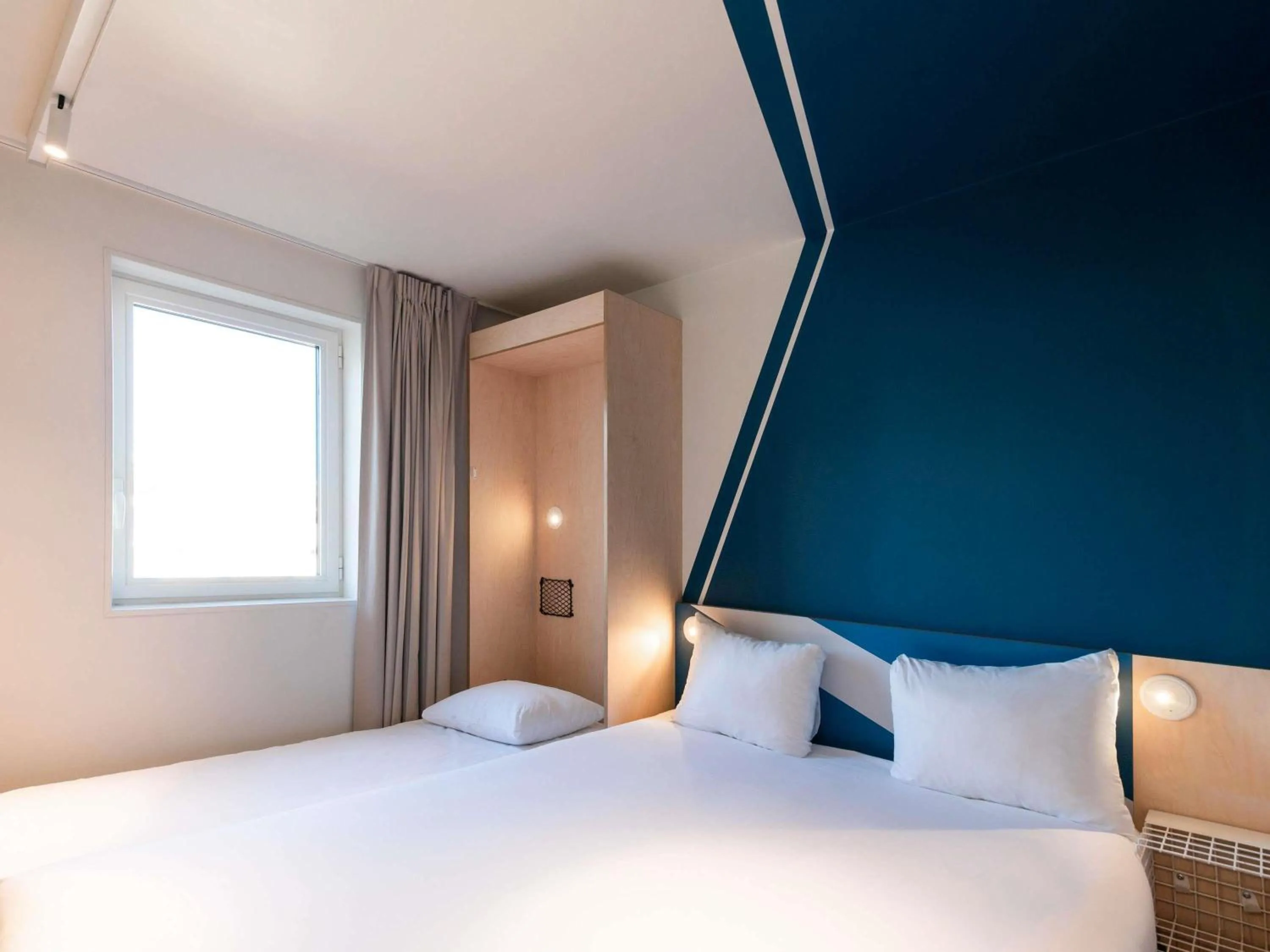 Bedroom, Bed in ibis budget Lyon Centre Confluence