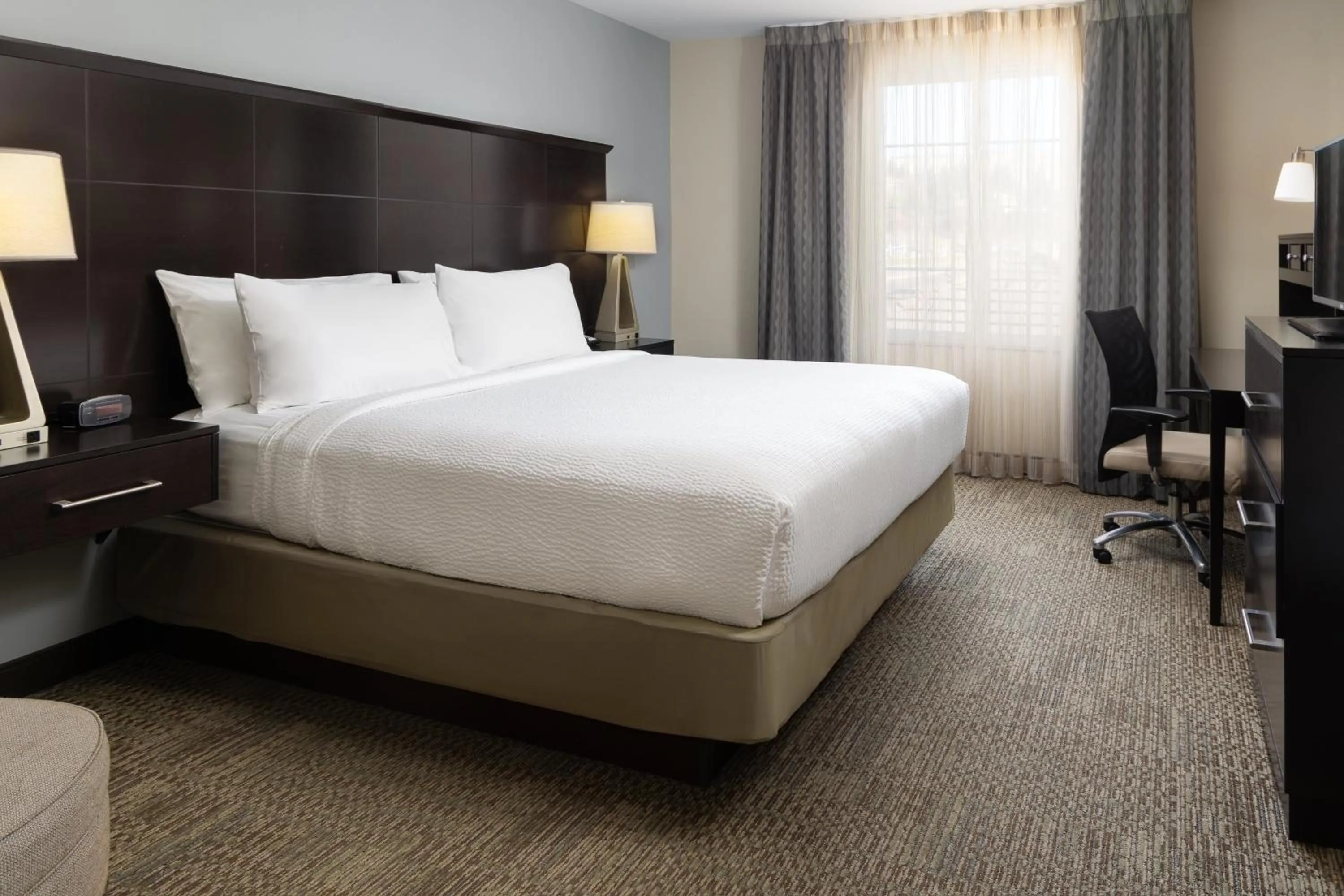 Photo of the whole room, Bed in Staybridge Suites Sacramento-Folsom by IHG
