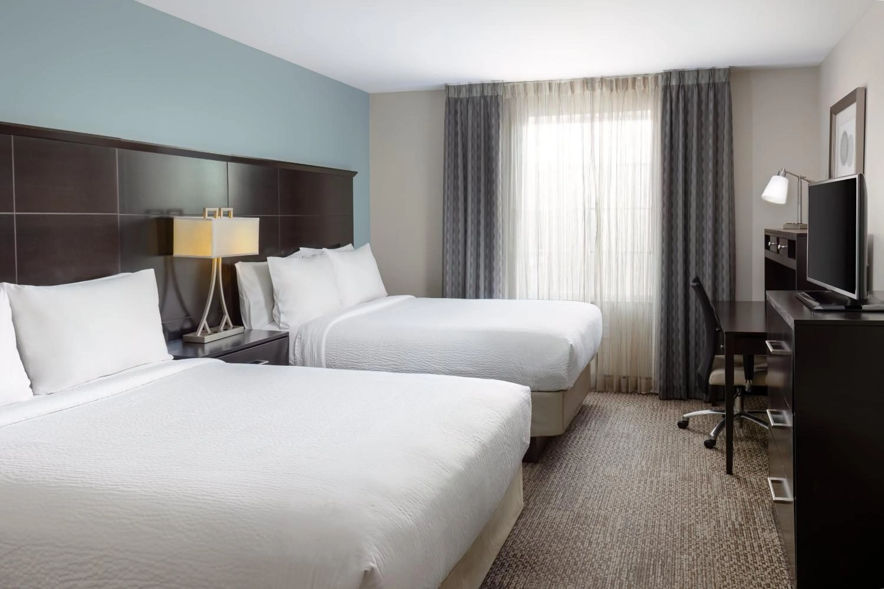 Photo of the whole room, Bed in Staybridge Suites Sacramento-Folsom by IHG