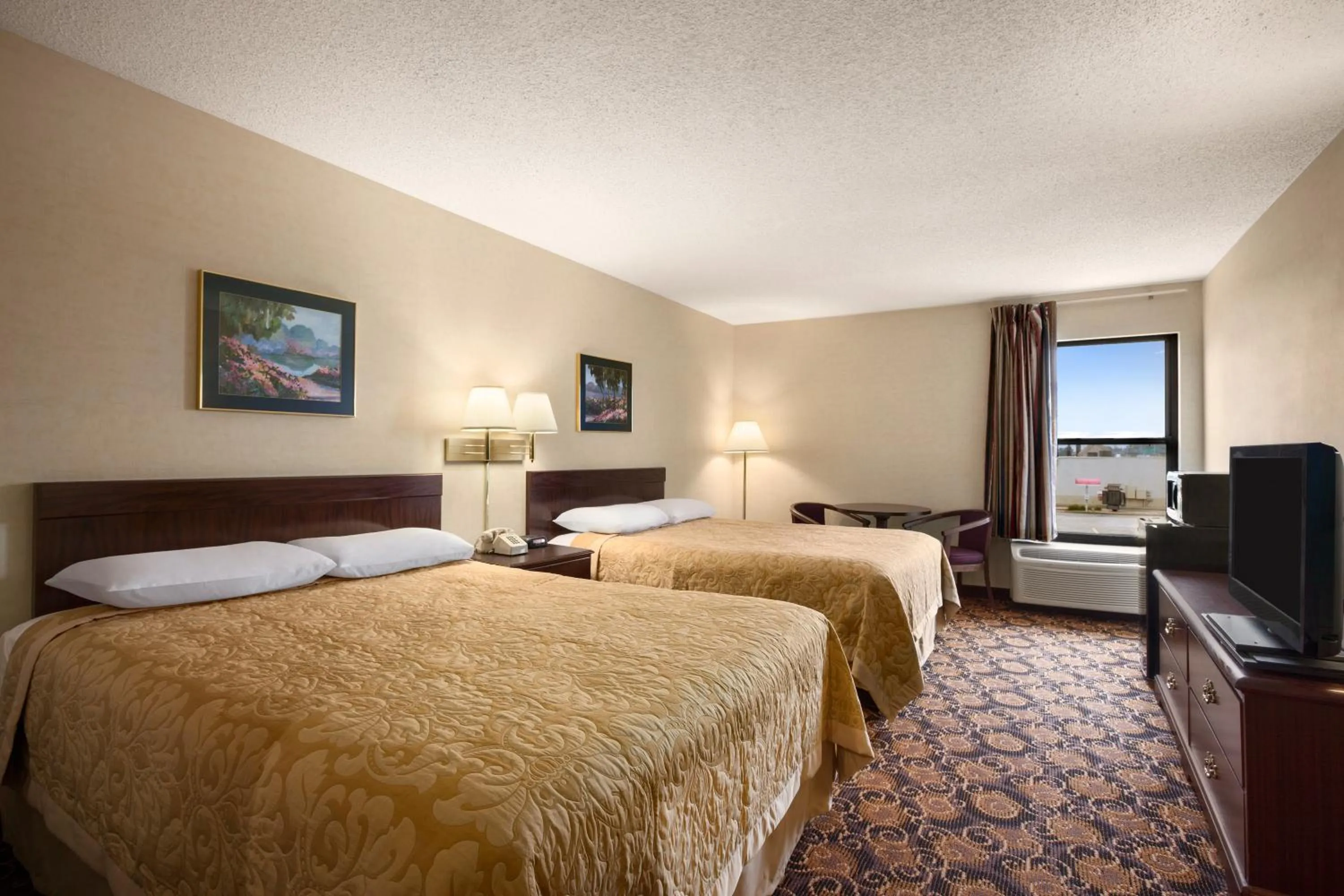 Bed in Super 8 by Wyndham Evansville North