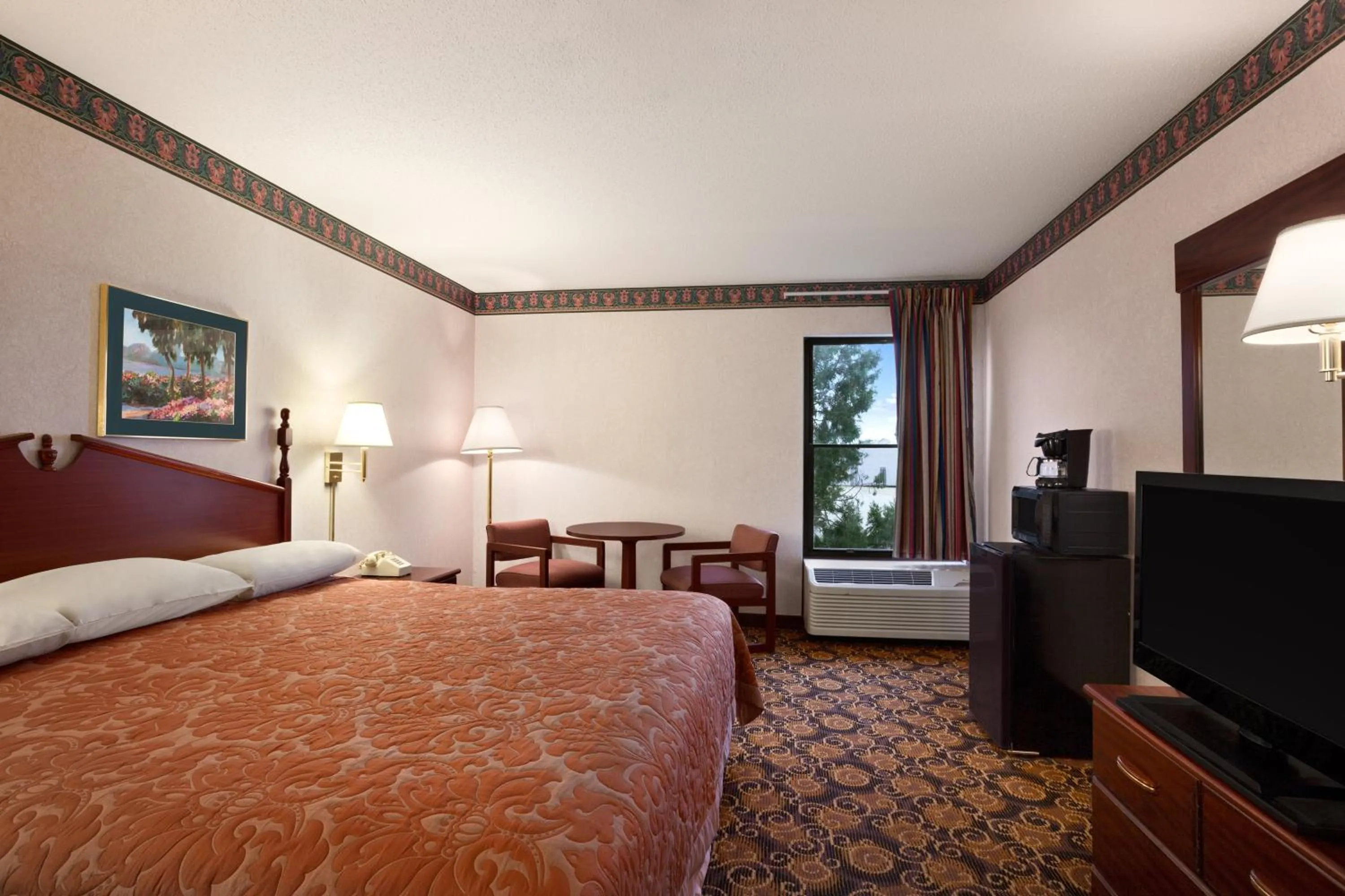 Bed in Super 8 by Wyndham Evansville North