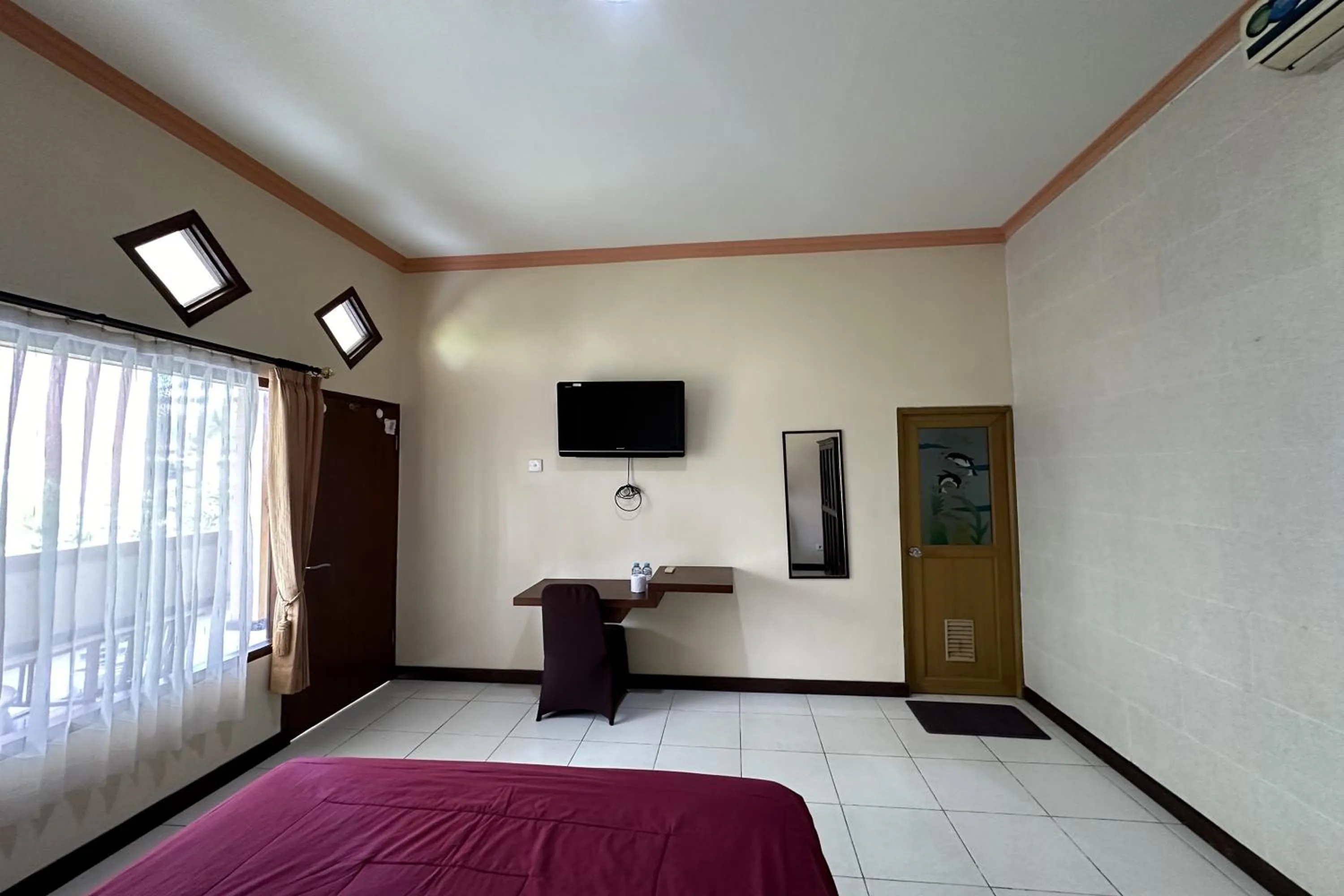 TV and multimedia, Bed in Taxa Raya Guest House