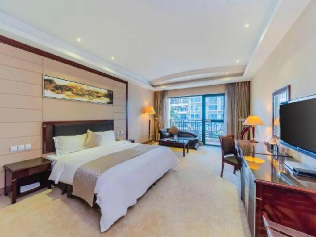 Bed in Dongguan Metropolitan Yijing Hotel