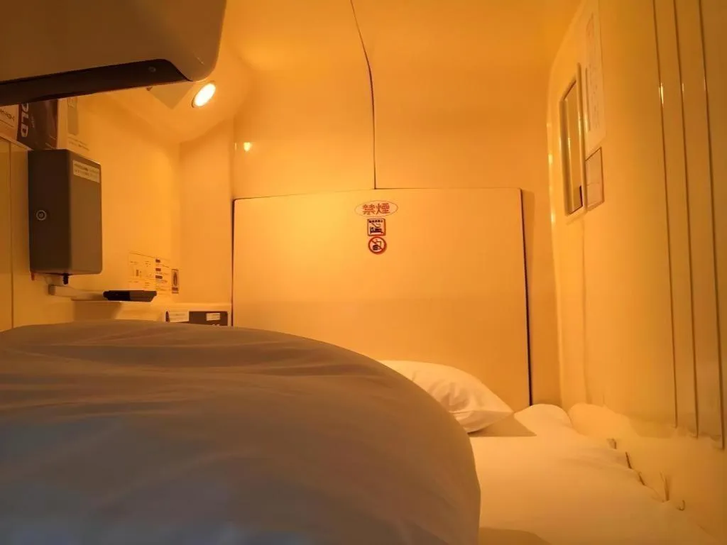 Bed in Itabashi Hotel Hilltop