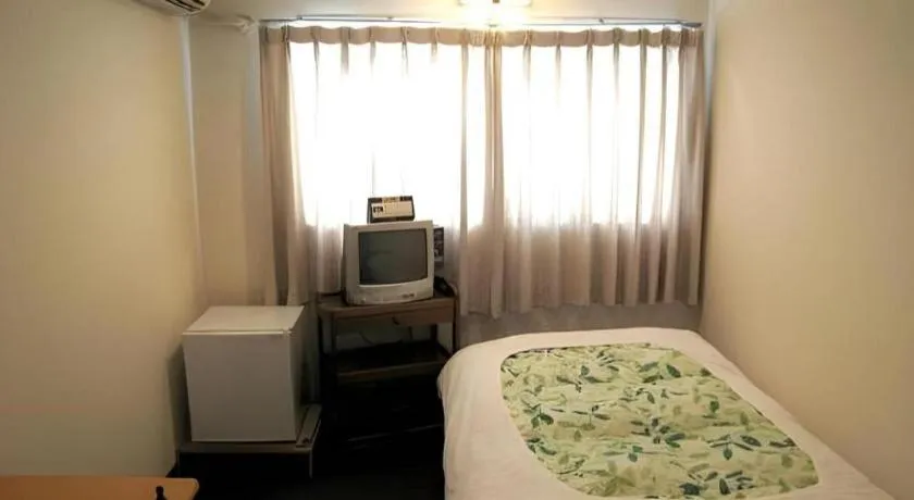 Bed in Itabashi Hotel Hilltop