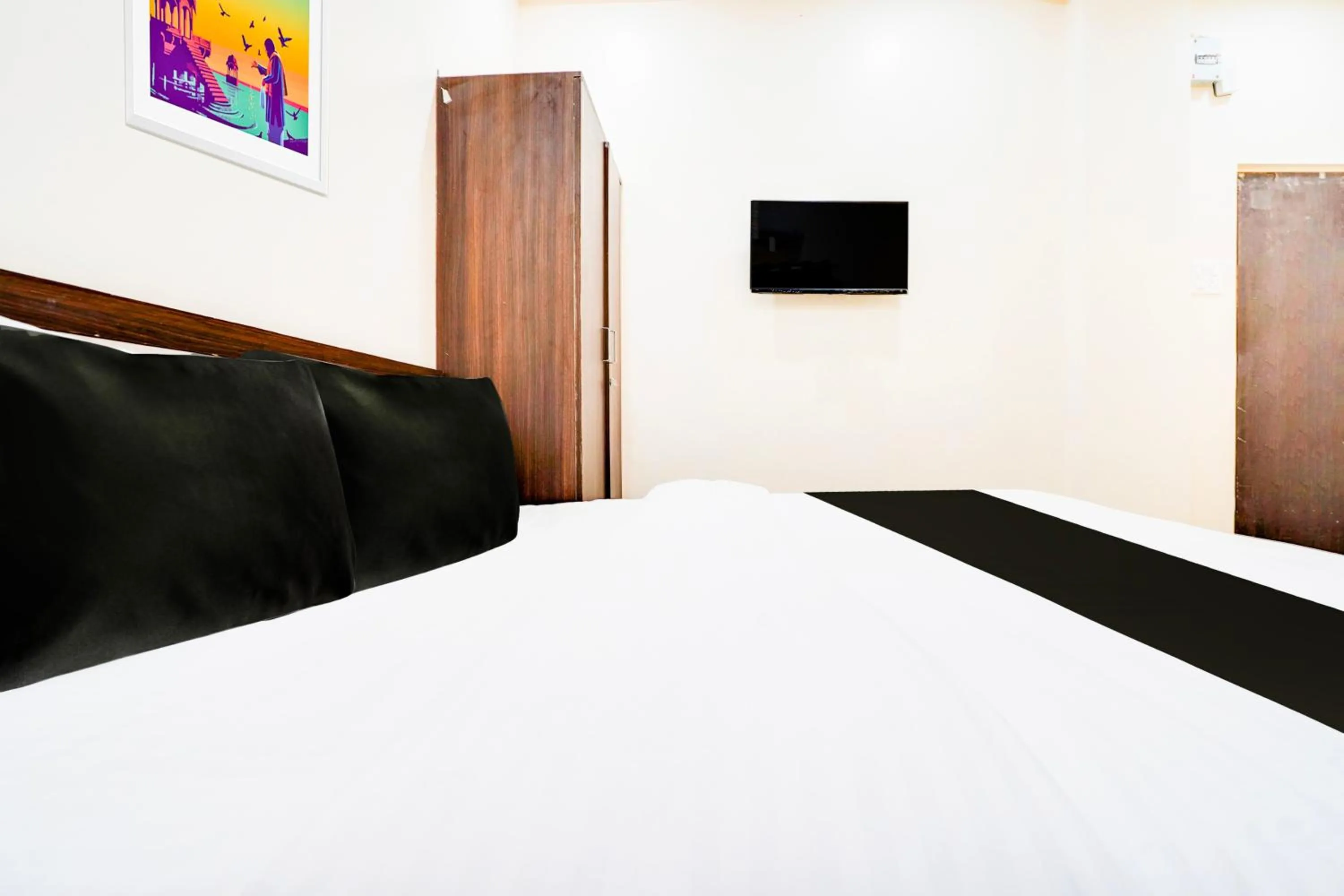 Bedroom in Hotel O UTS STAY IN