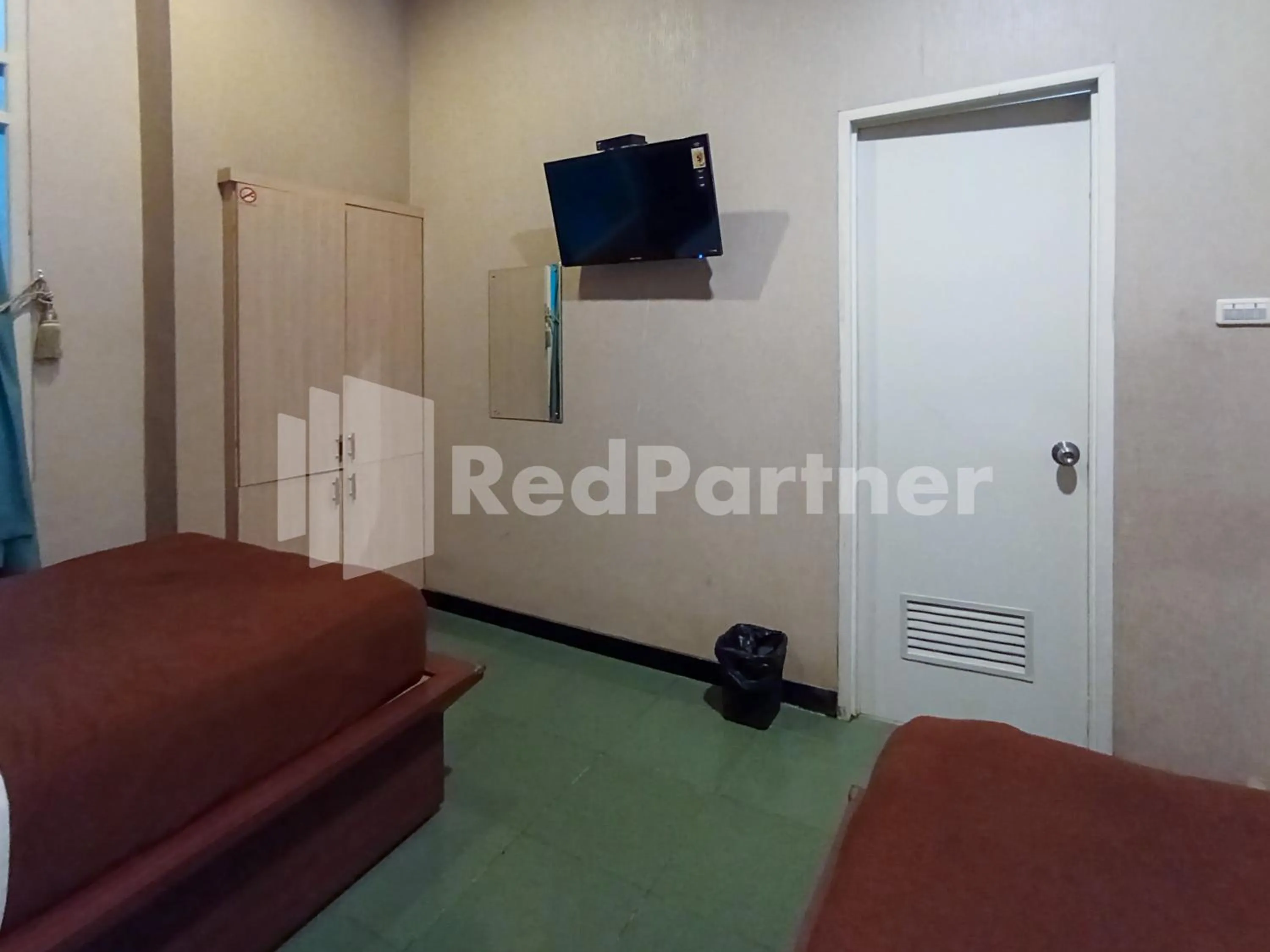 Bedroom in Nillo Hotel Kebumen Mitra RedDoorz