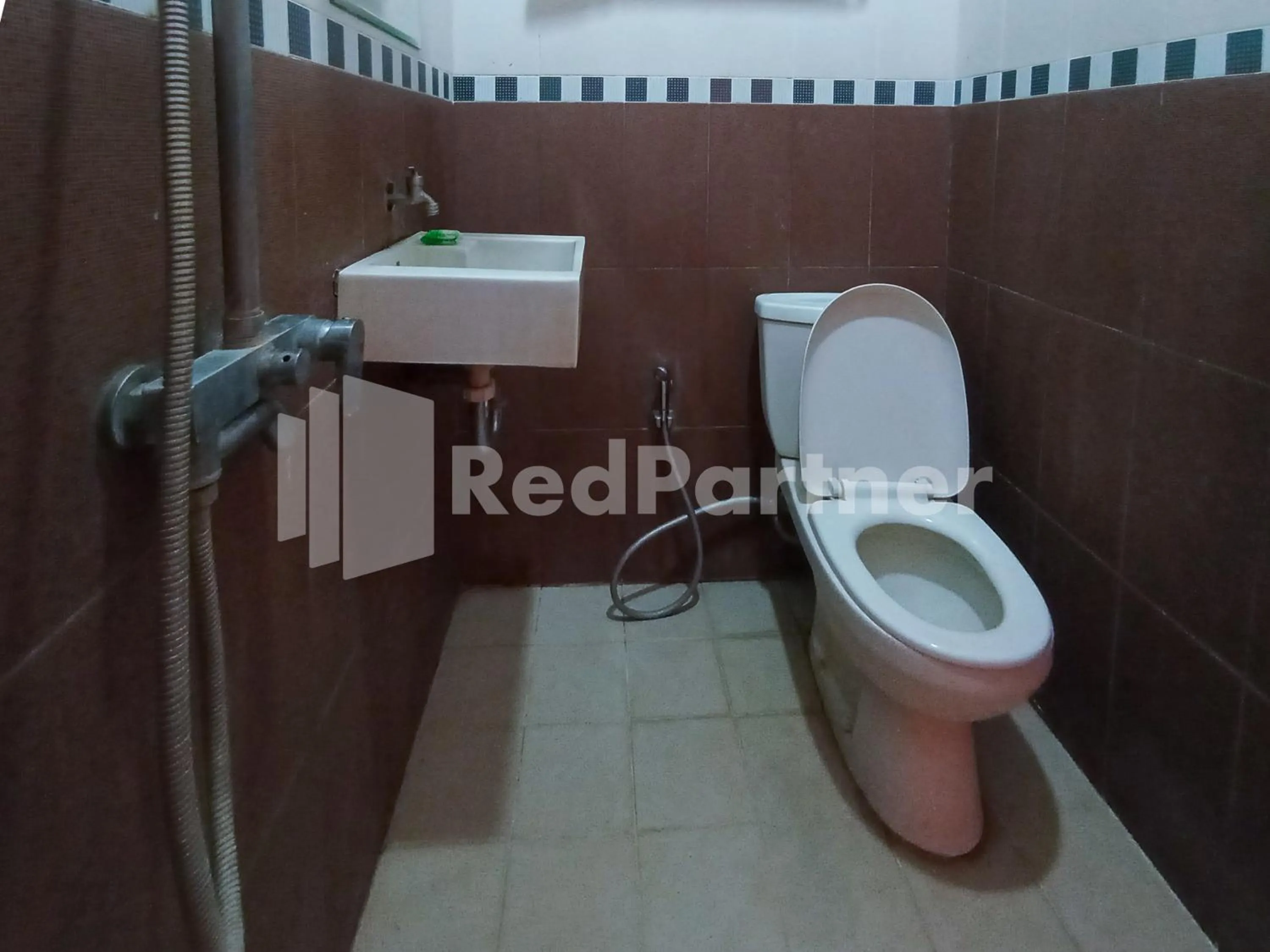 Bathroom in Nillo Hotel Kebumen Mitra RedDoorz