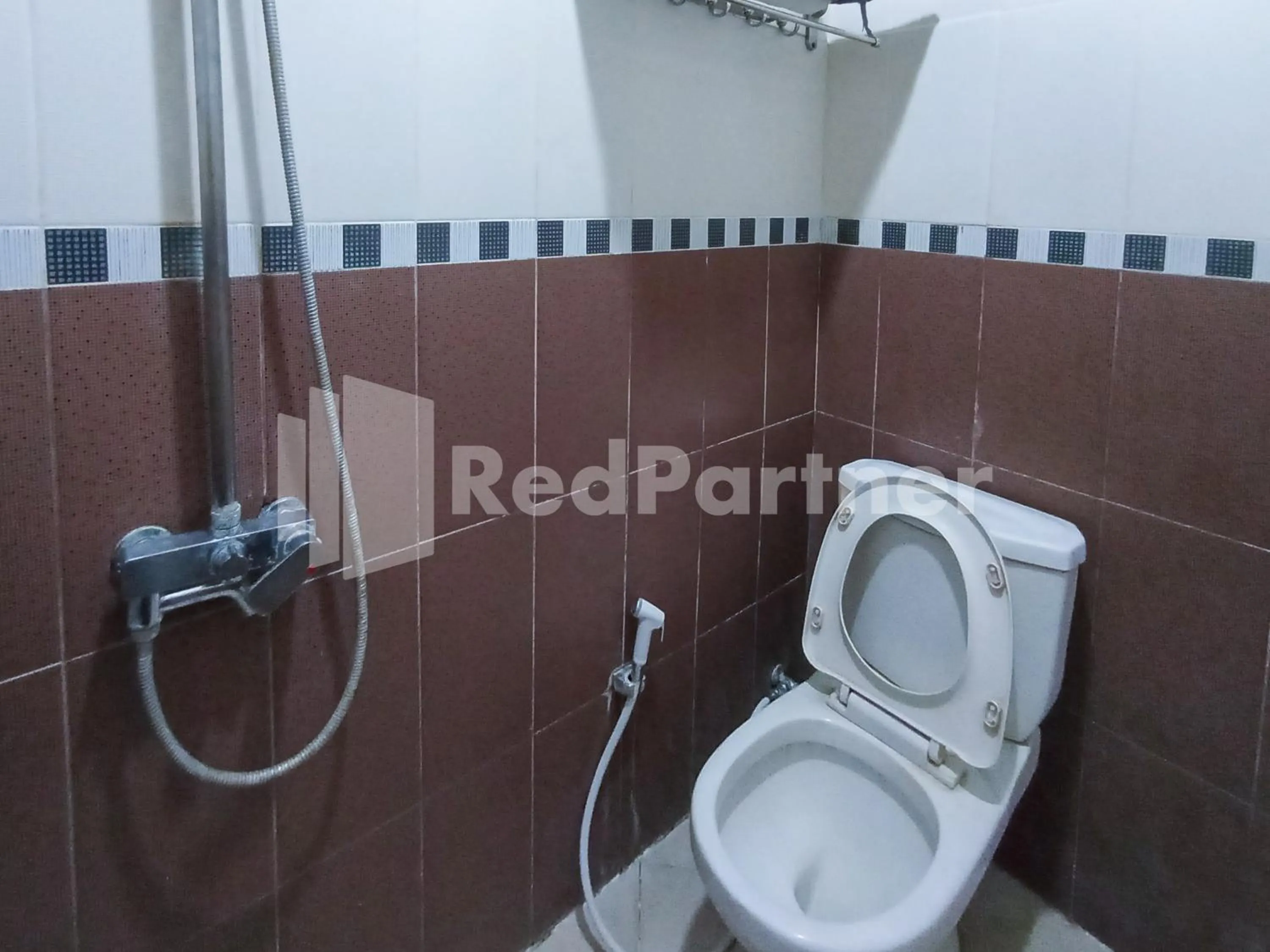 Bathroom in Nillo Hotel Kebumen Mitra RedDoorz