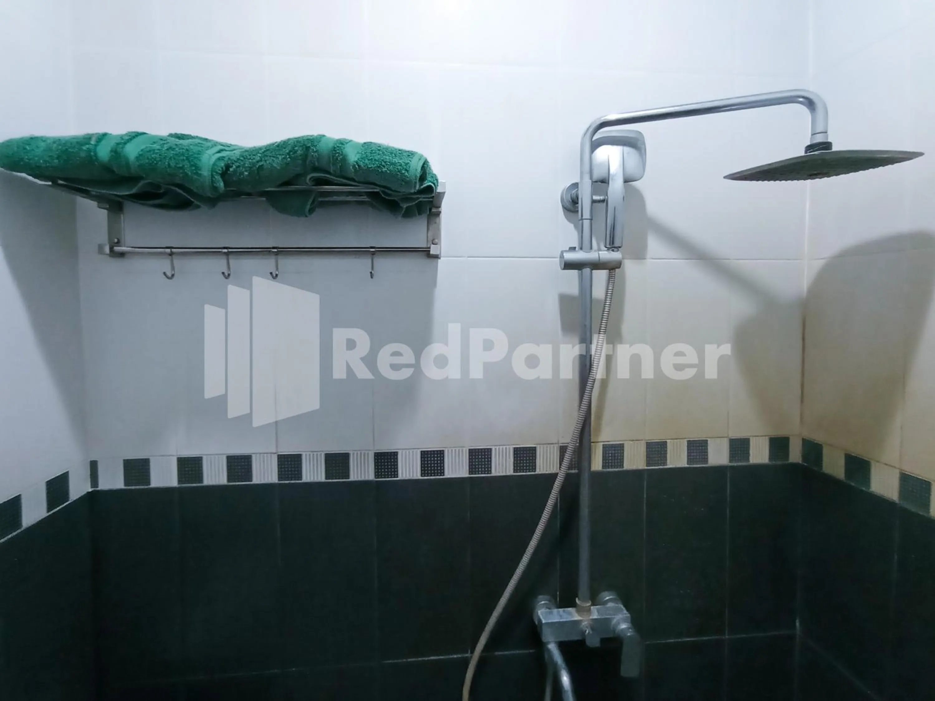 Bathroom in Nillo Hotel Kebumen Mitra RedDoorz