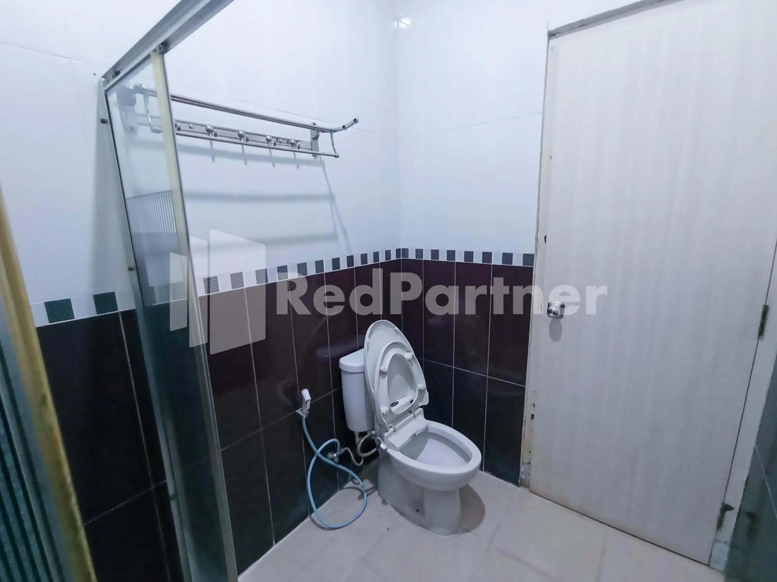 Bathroom in Nillo Hotel Kebumen Mitra RedDoorz