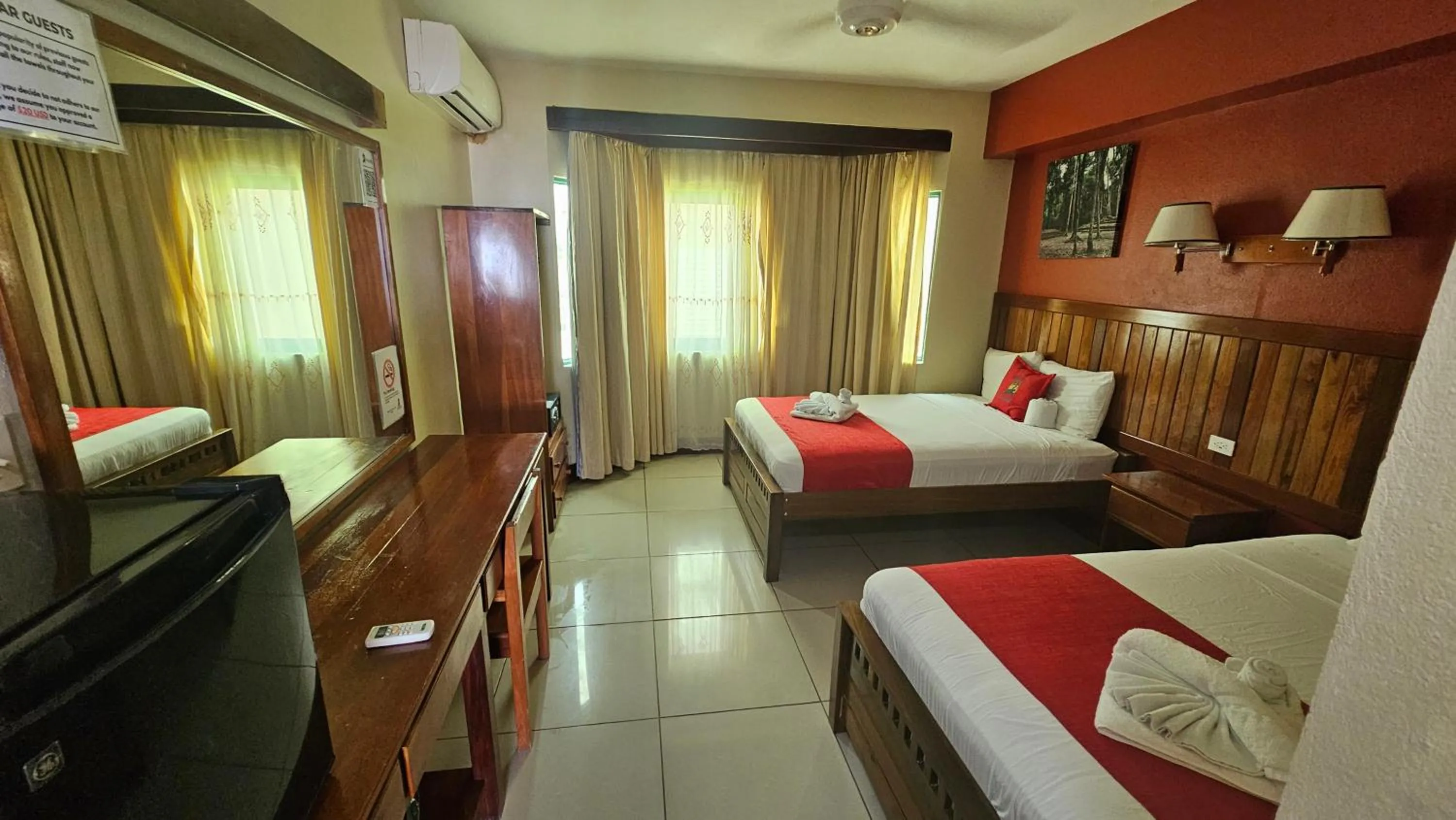 Bedroom, Bed in Caye Caulker Plaza Hotel