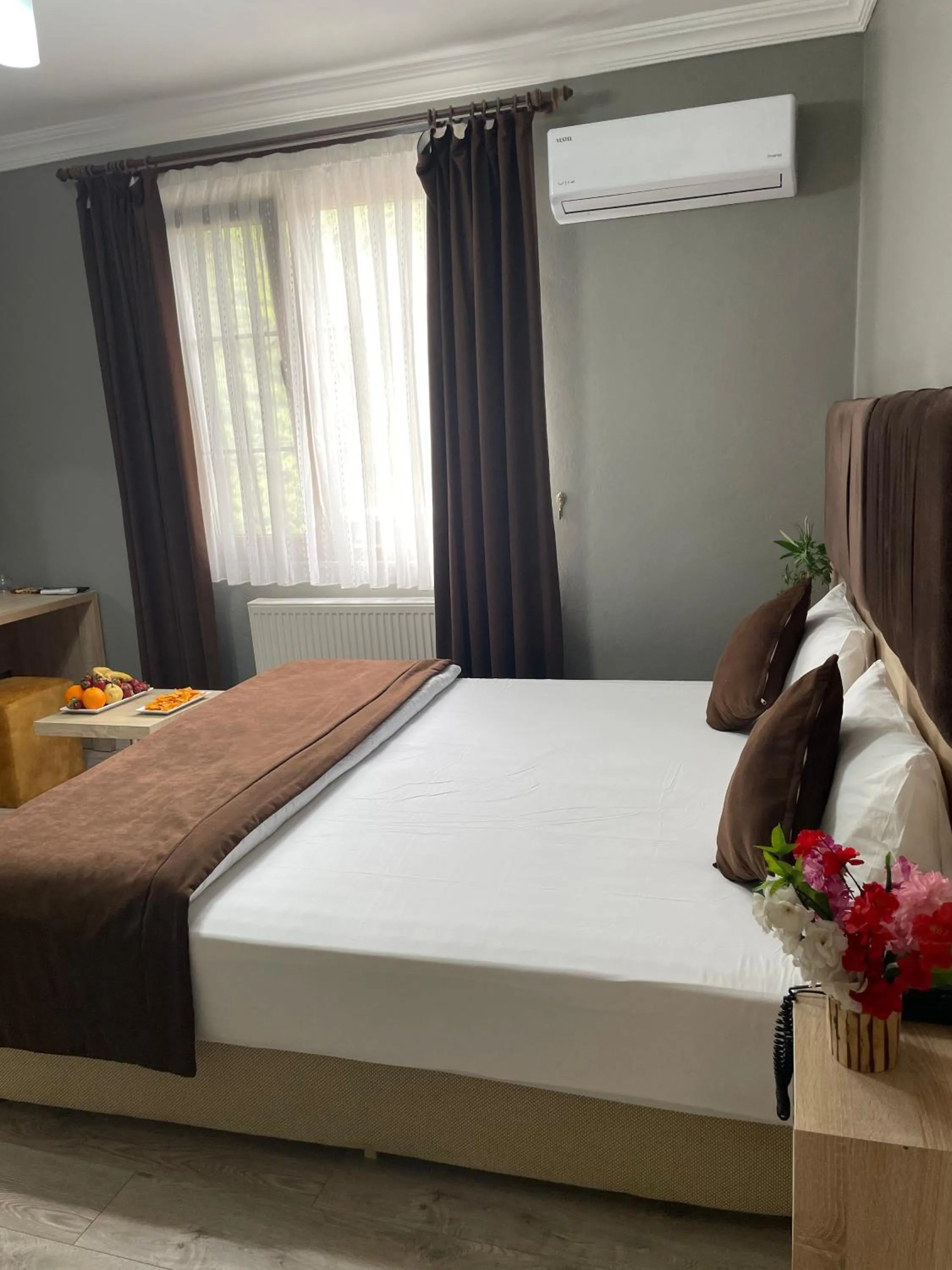 Bed in PUGARi HOTEL