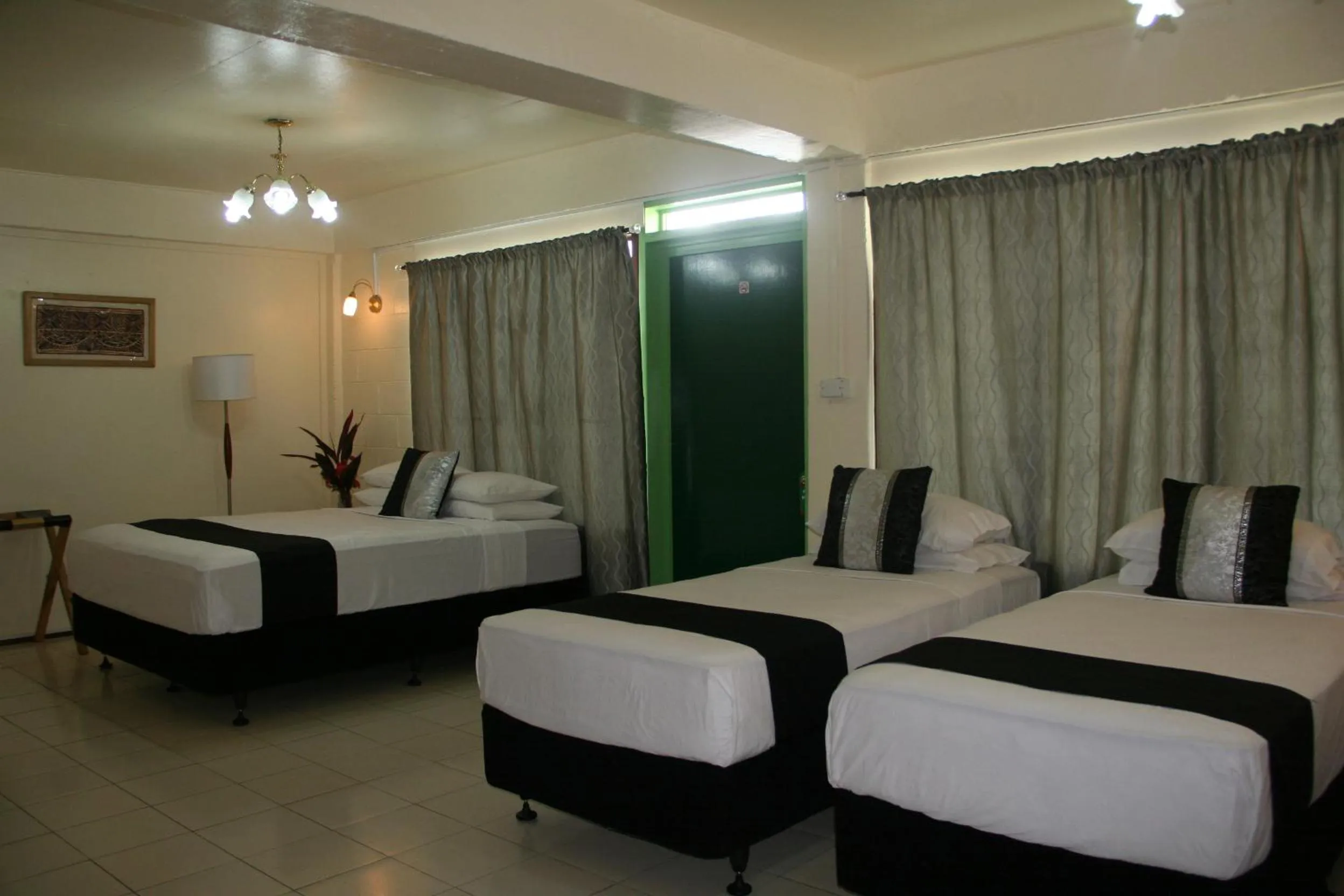Photo of the whole room, Bed in Moatoga Hotel