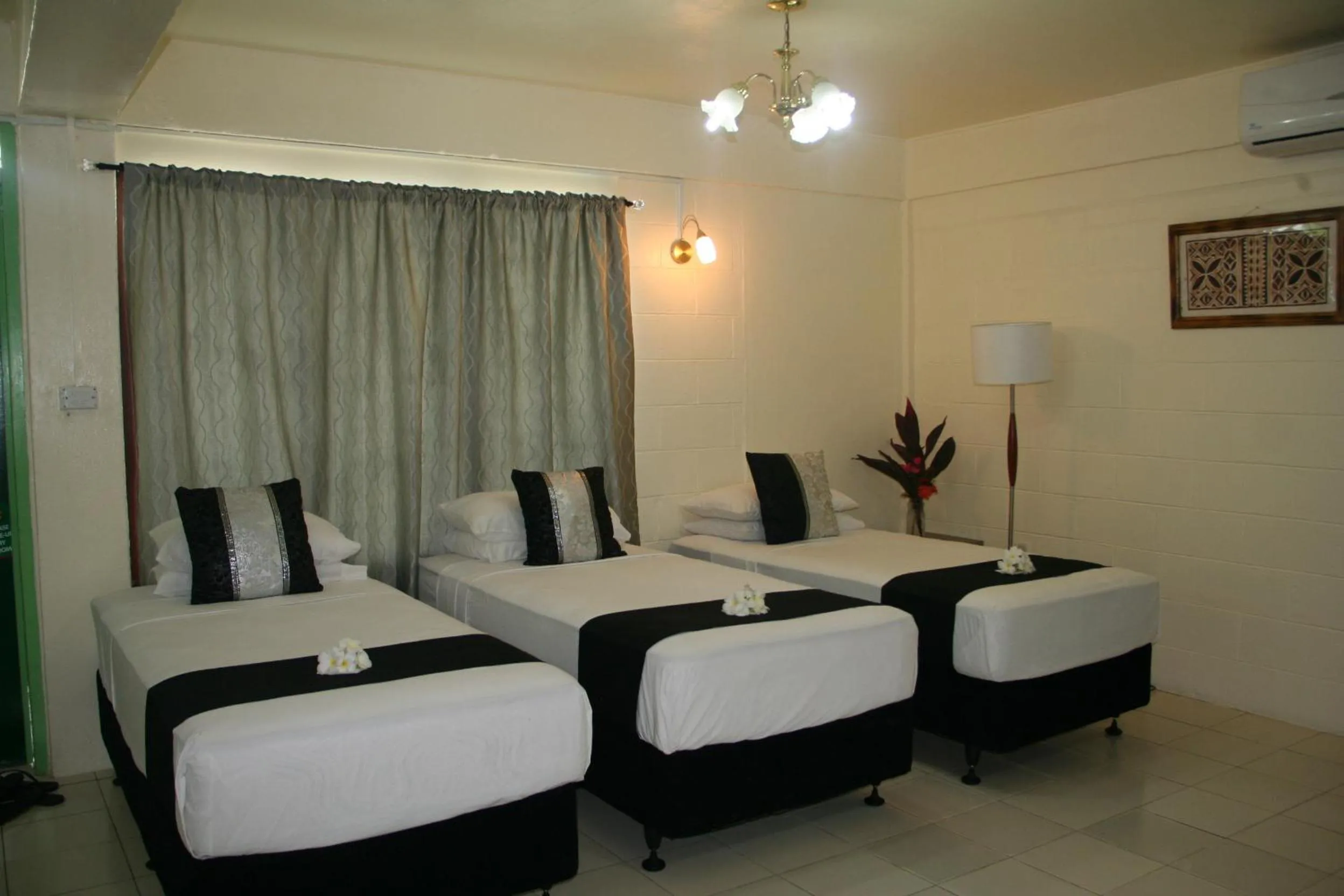 Photo of the whole room, Bed in Moatoga Hotel