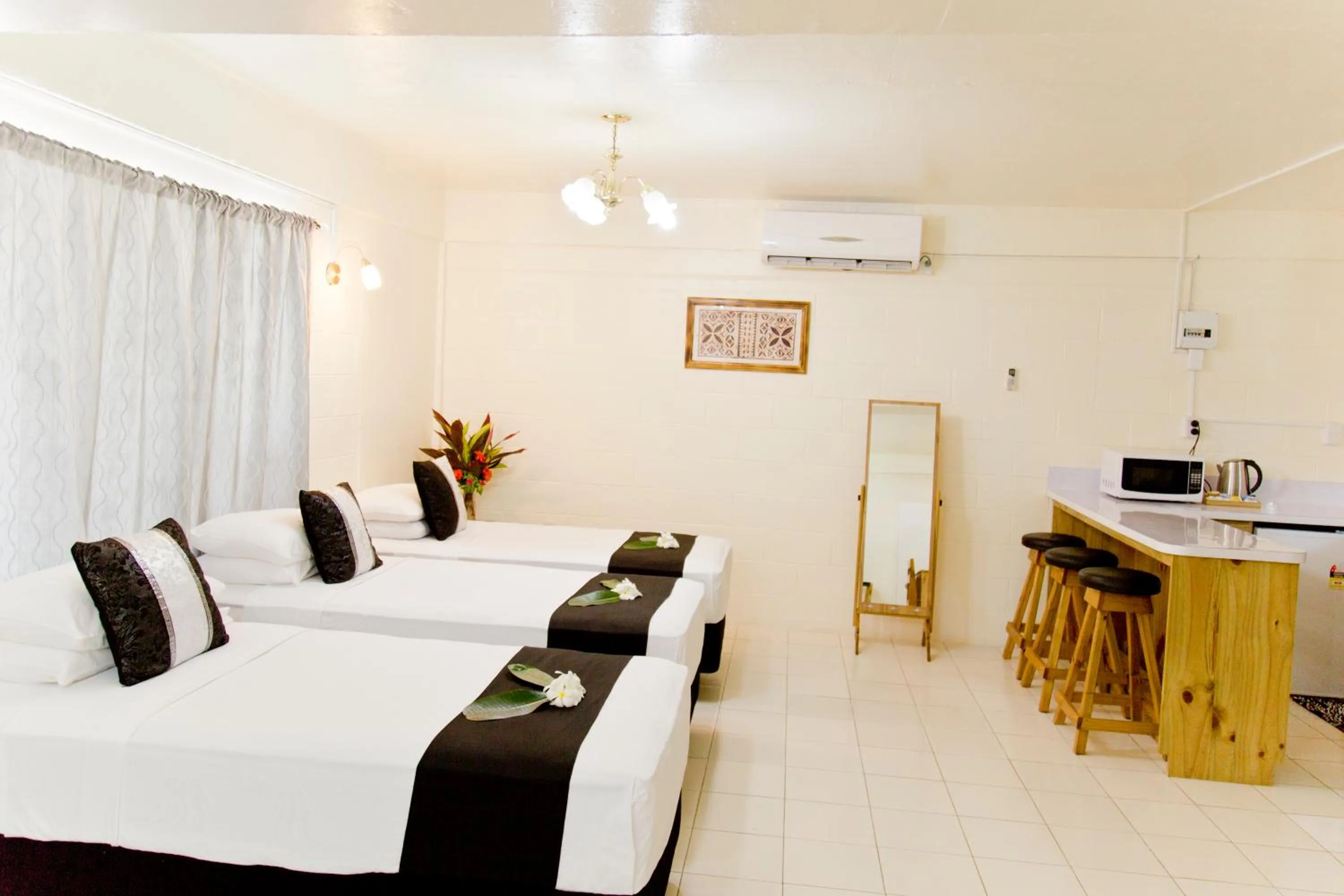 Photo of the whole room, Bed in Moatoga Hotel