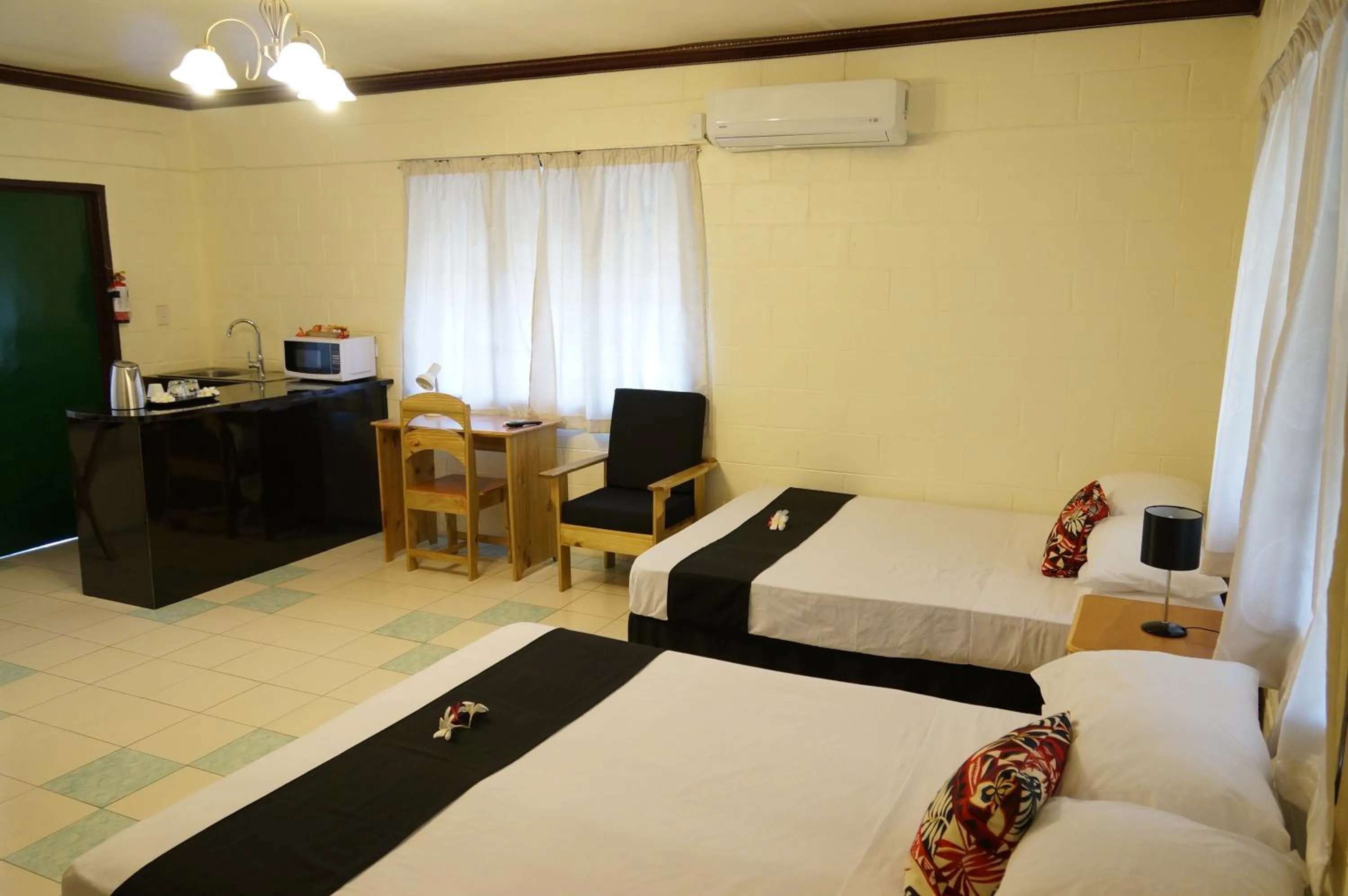 Photo of the whole room, Bed in Moatoga Hotel