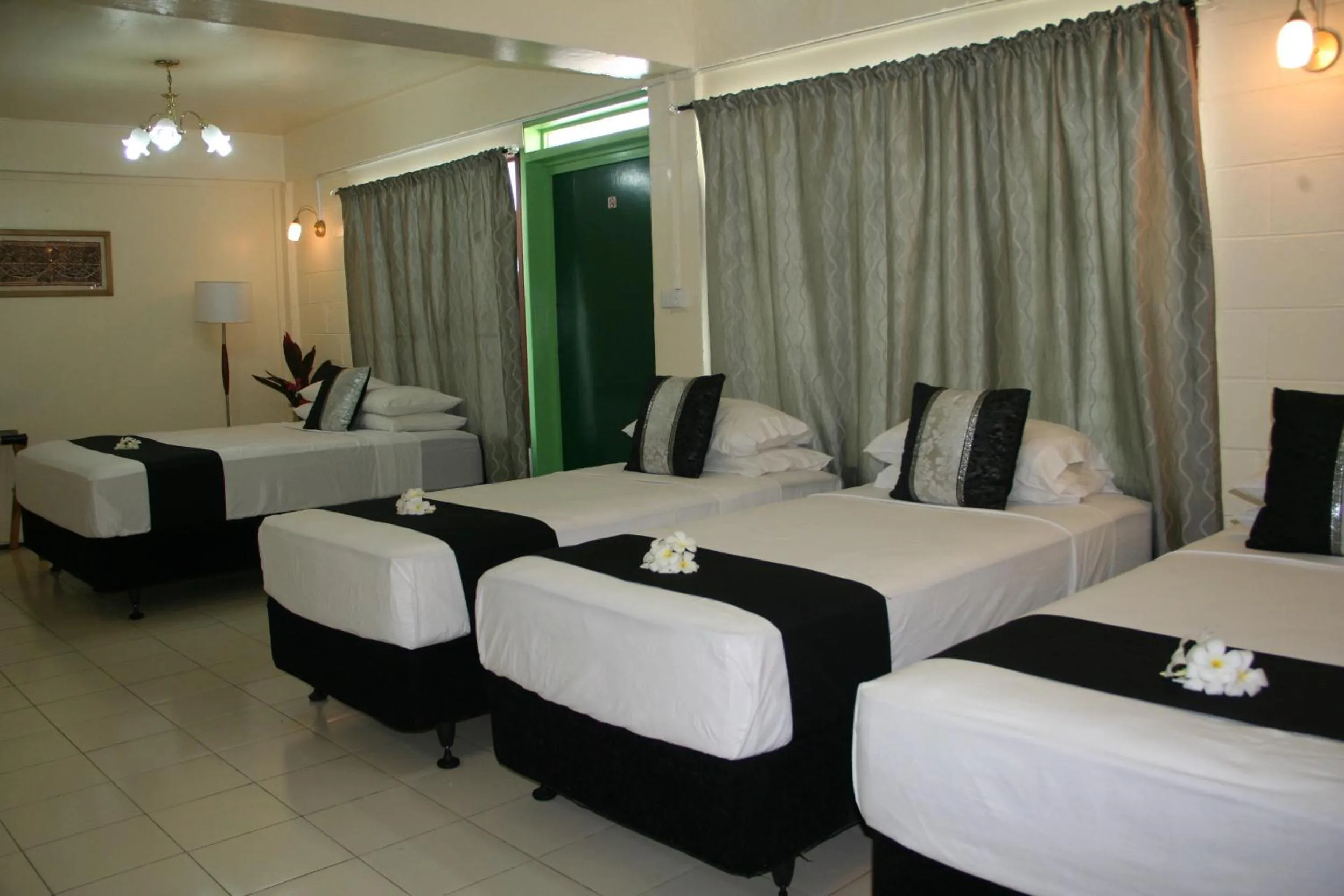 Photo of the whole room, Bed in Moatoga Hotel