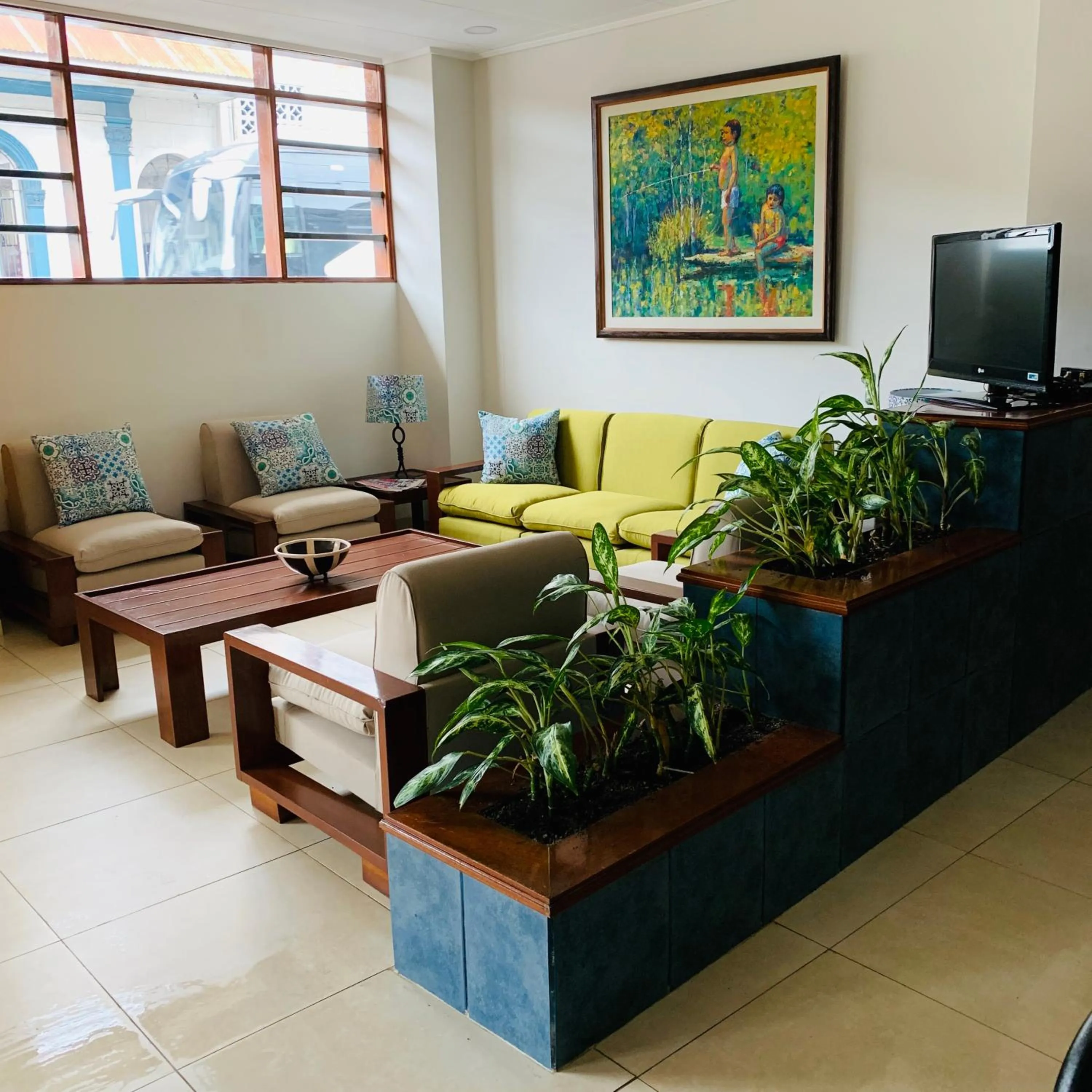 Communal lounge/ TV room in Hotel Acosta