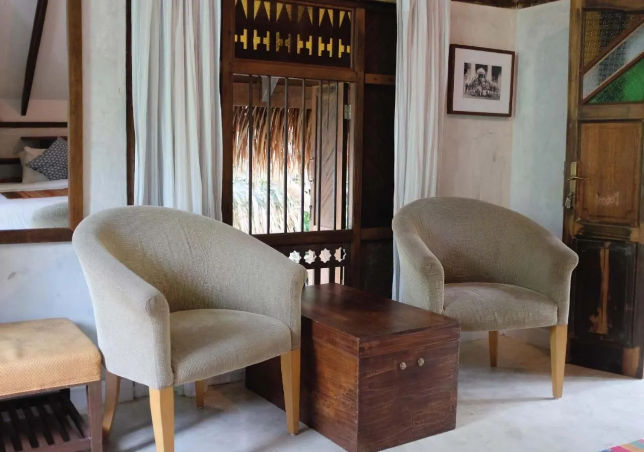 Living room in Panji Panji Tropical Wooden Home