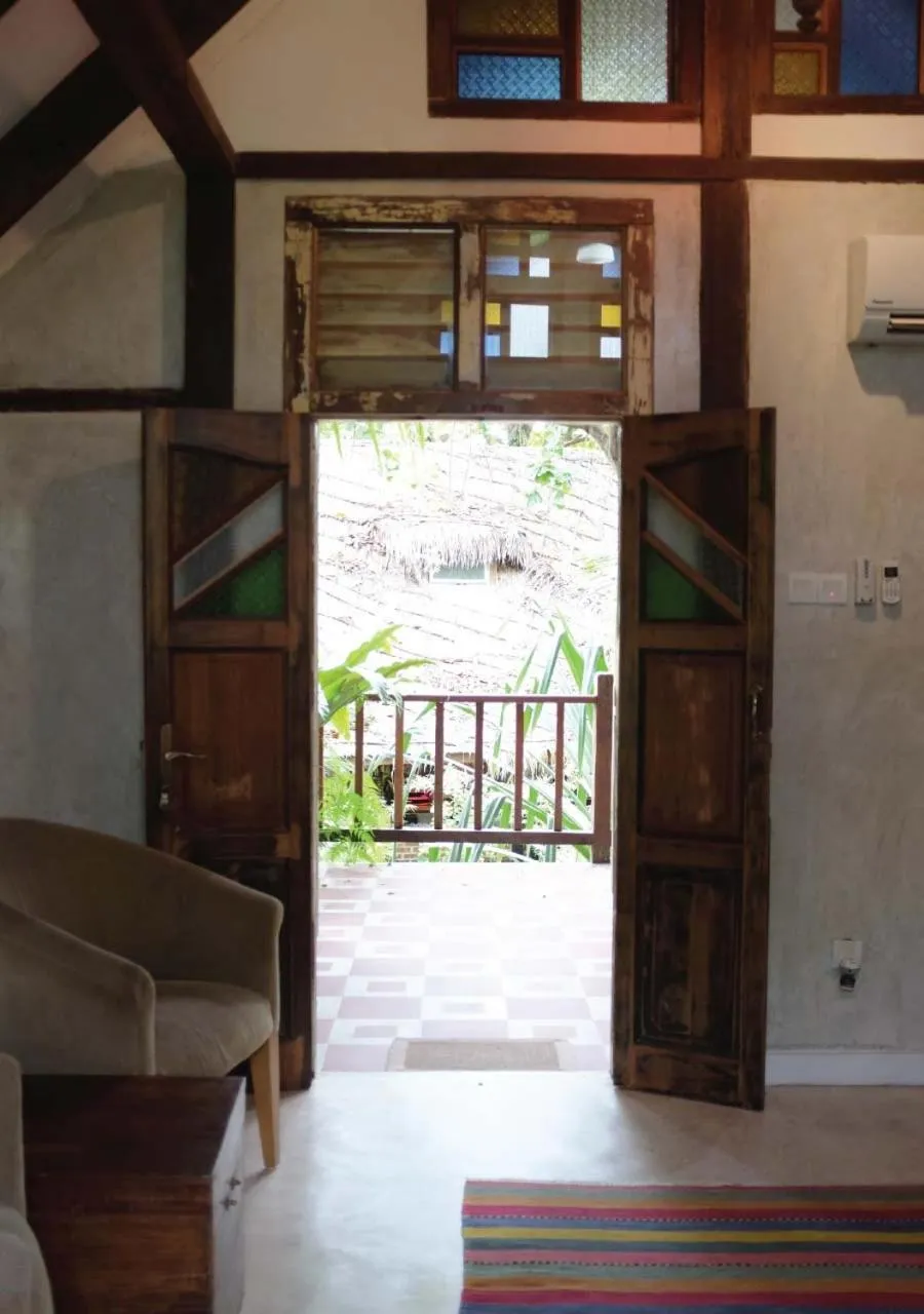 Living room in Panji Panji Tropical Wooden Home