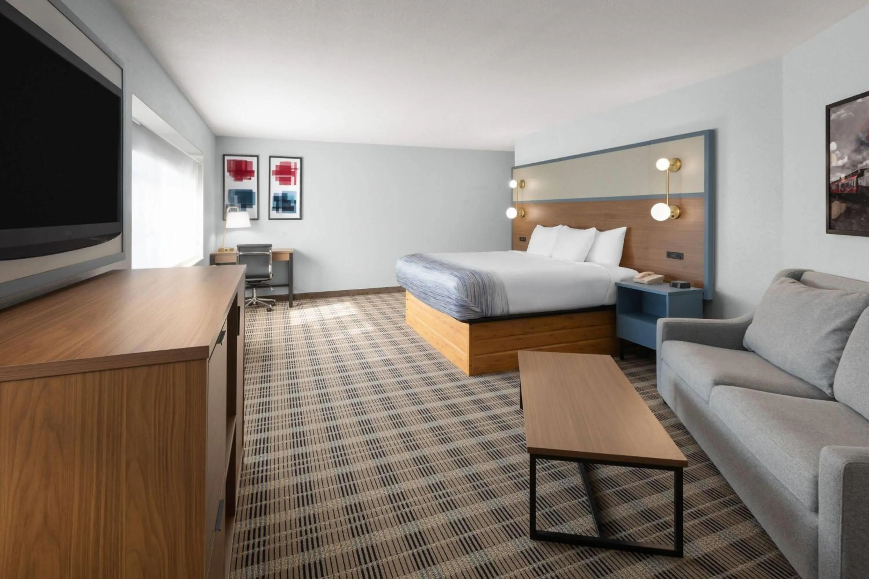 Photo of the whole room, Bed in AmericInn by Wyndham Douglas/Saugatuck