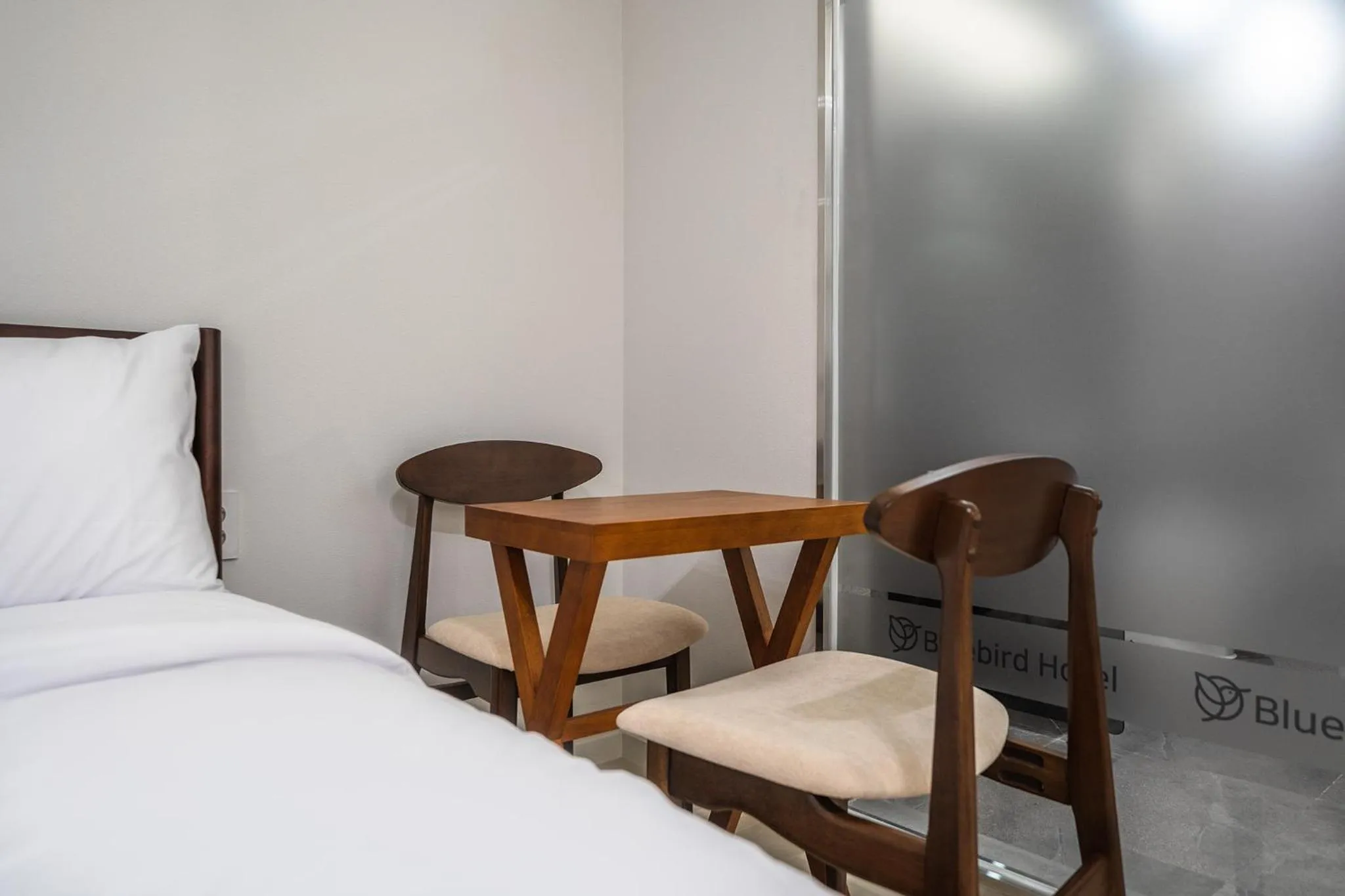 Bedroom, Bed in Bluebird Hotel