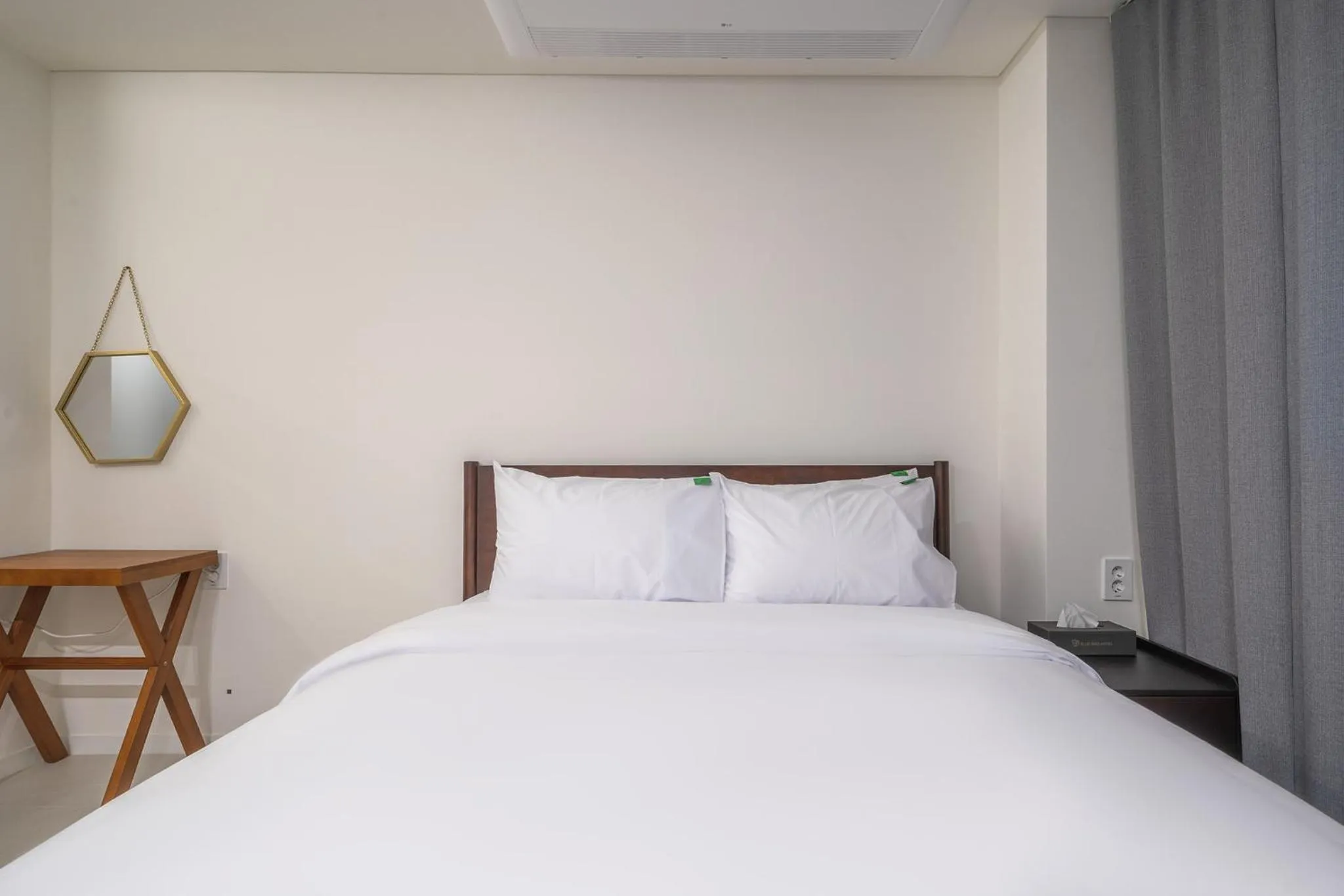 Bed in Bluebird Hotel