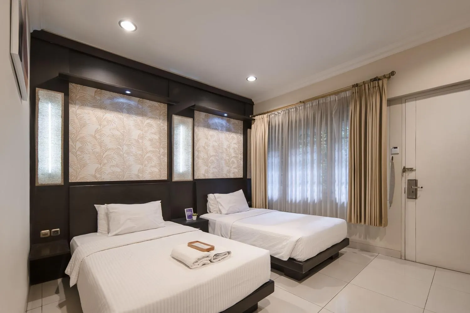 Bed in Cove Ottenville Boutique Hotel