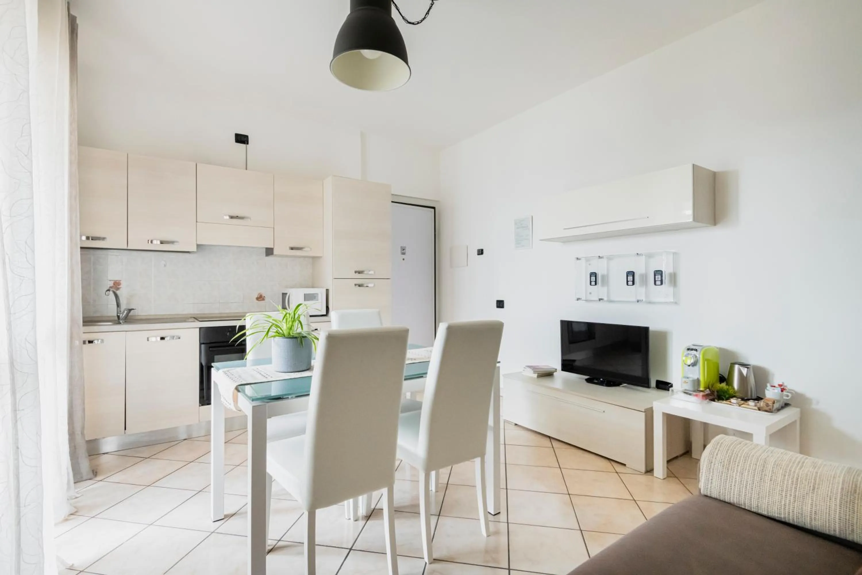 Dining area in HQ Aparthotel Milano Inn - Smart Suites