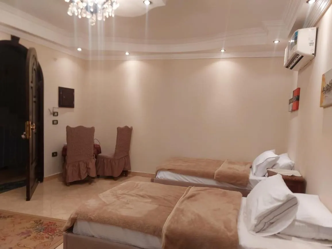 Bed in Queen of the pyramids hotel