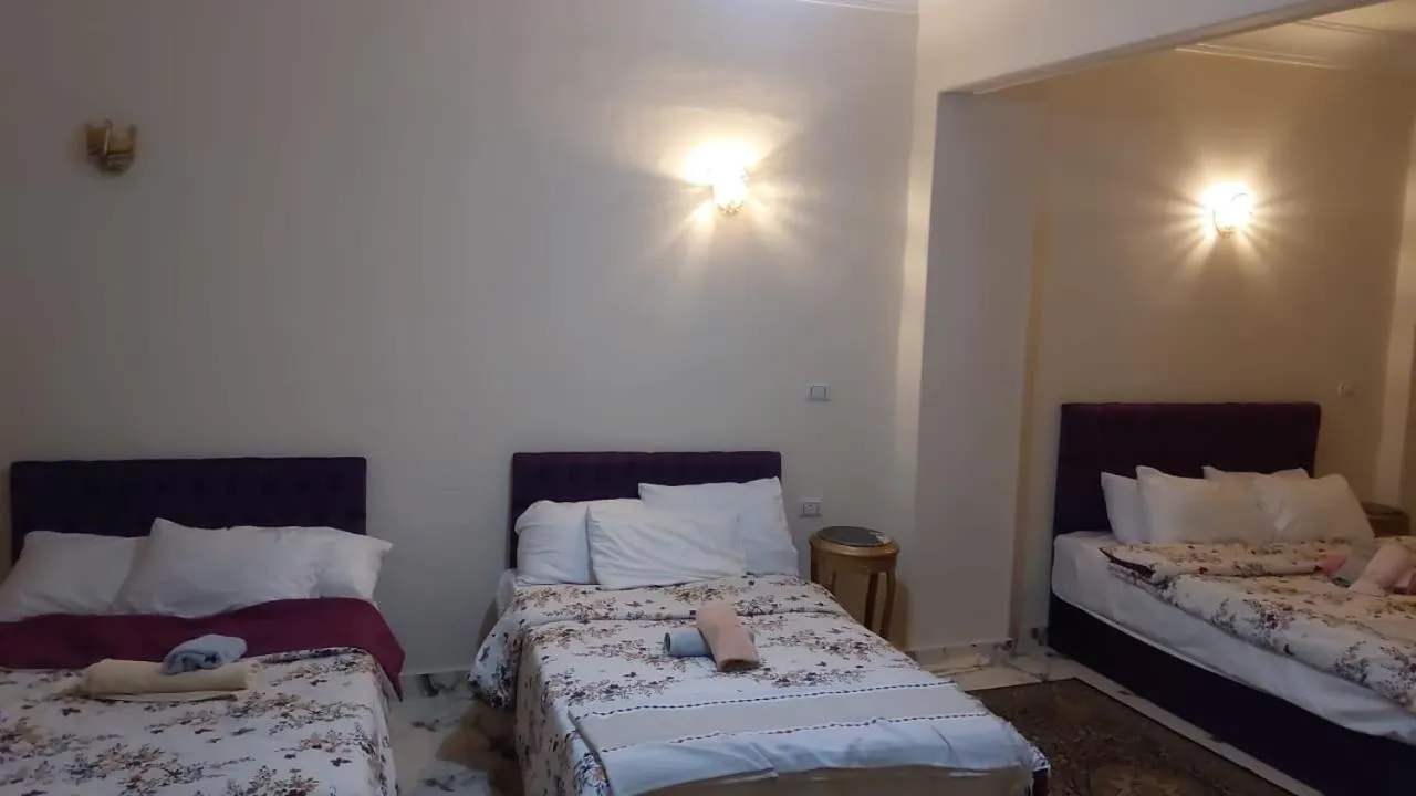 Bed in Queen of the pyramids hotel