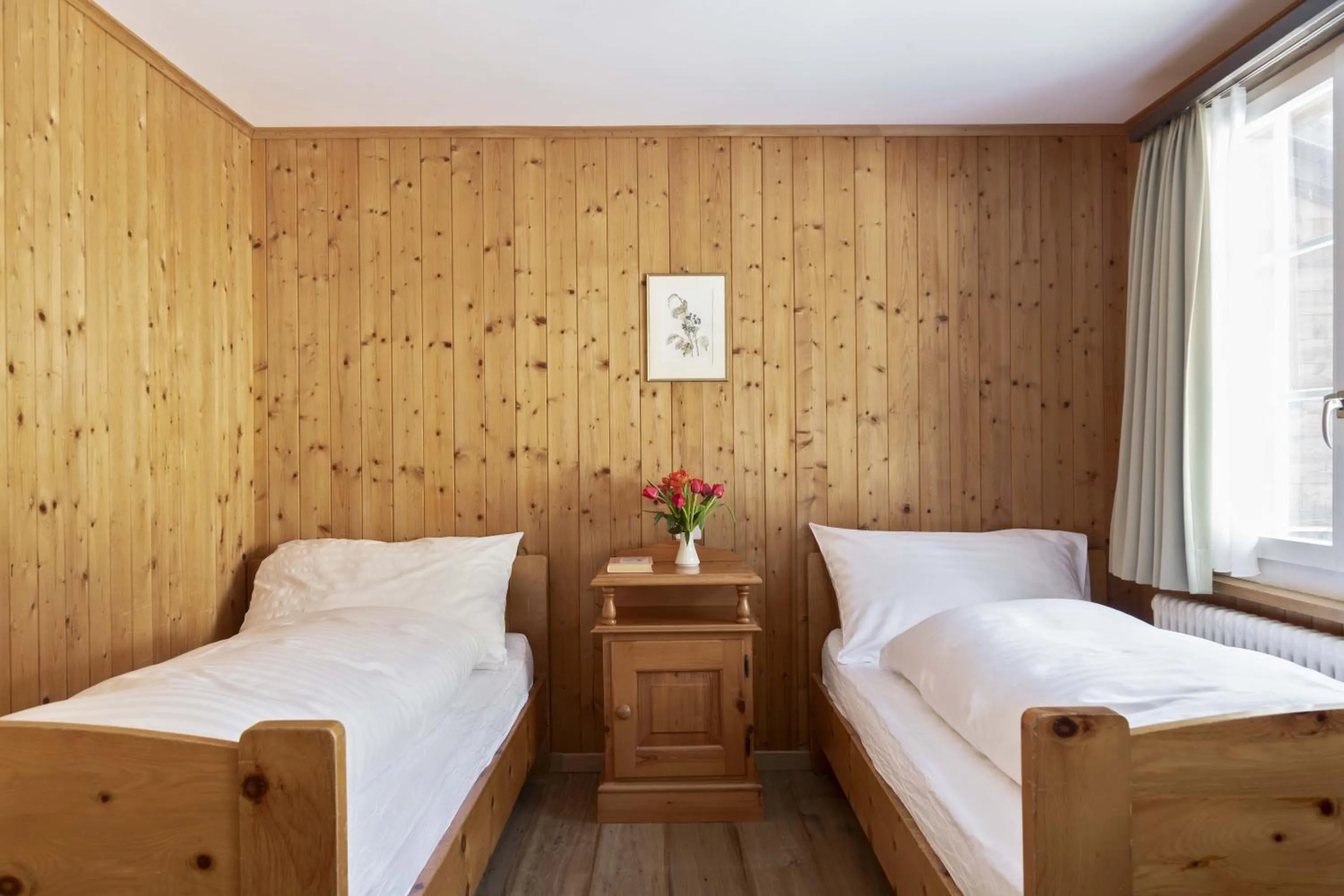 Bed in Chalet by Hotel Bad Serneus