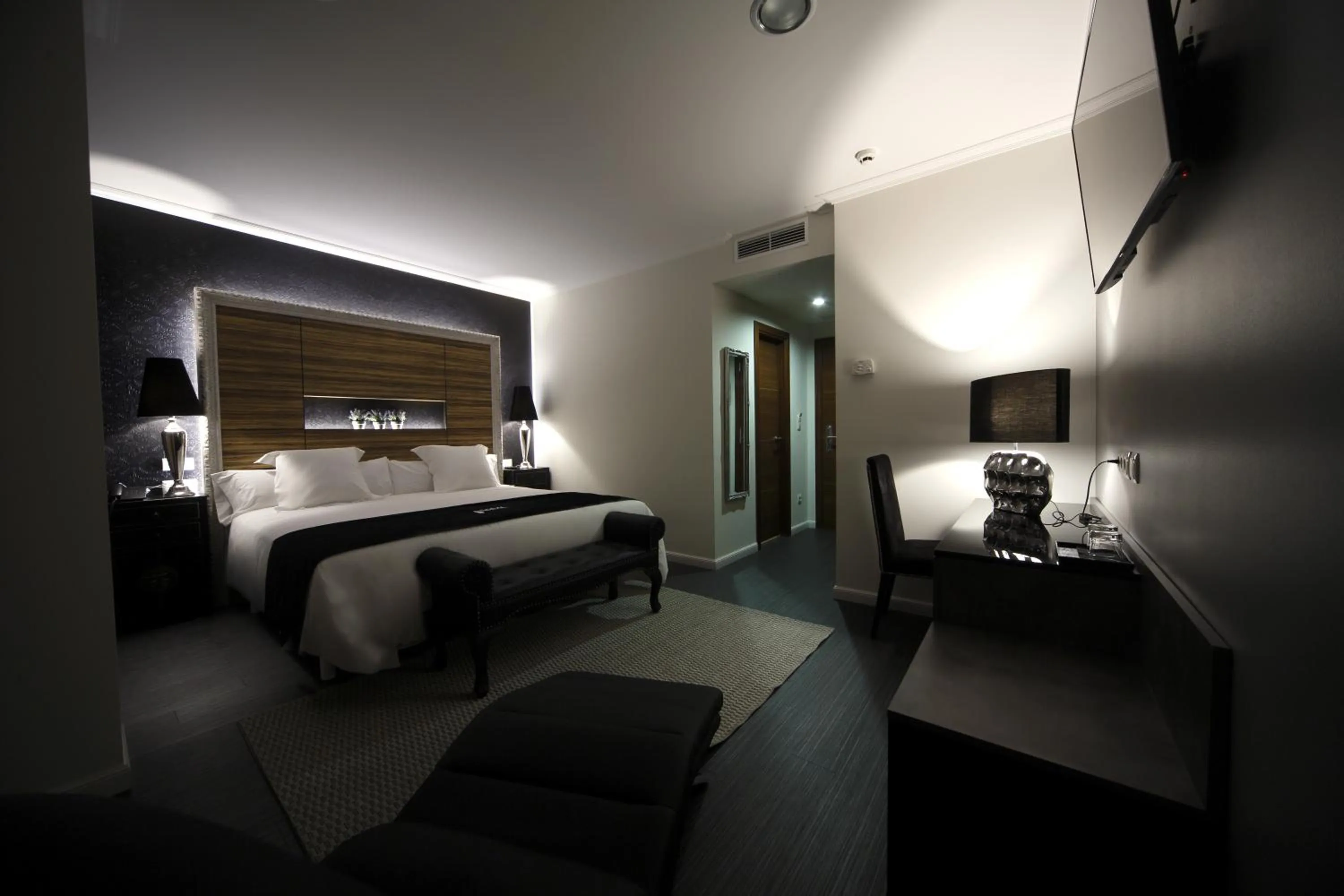 Bed in Capitol Boutique Hotel