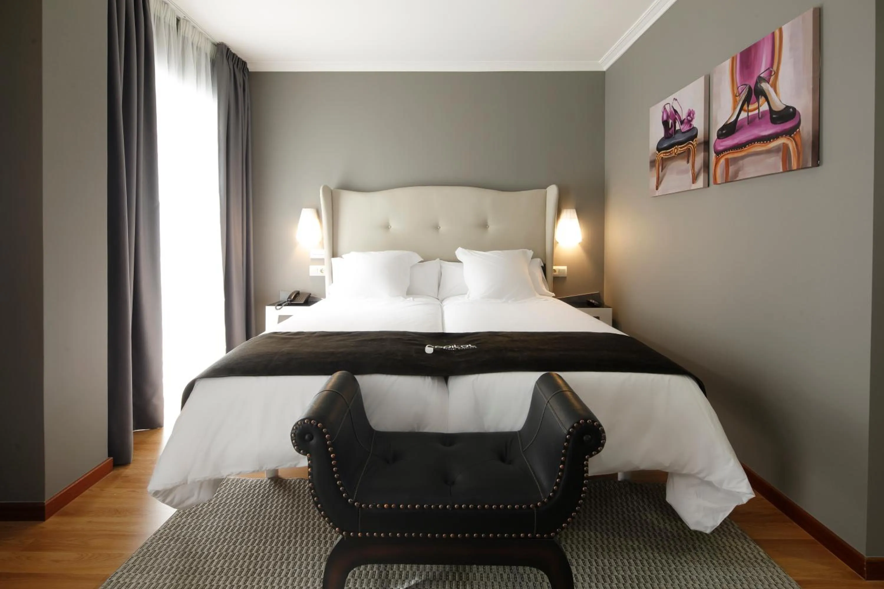 Bed in Capitol Boutique Hotel