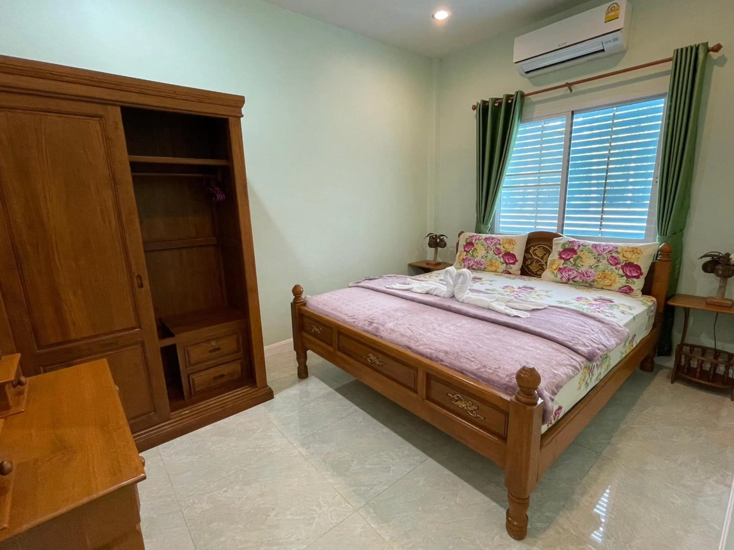 Bed in Blue Beach Bungalow