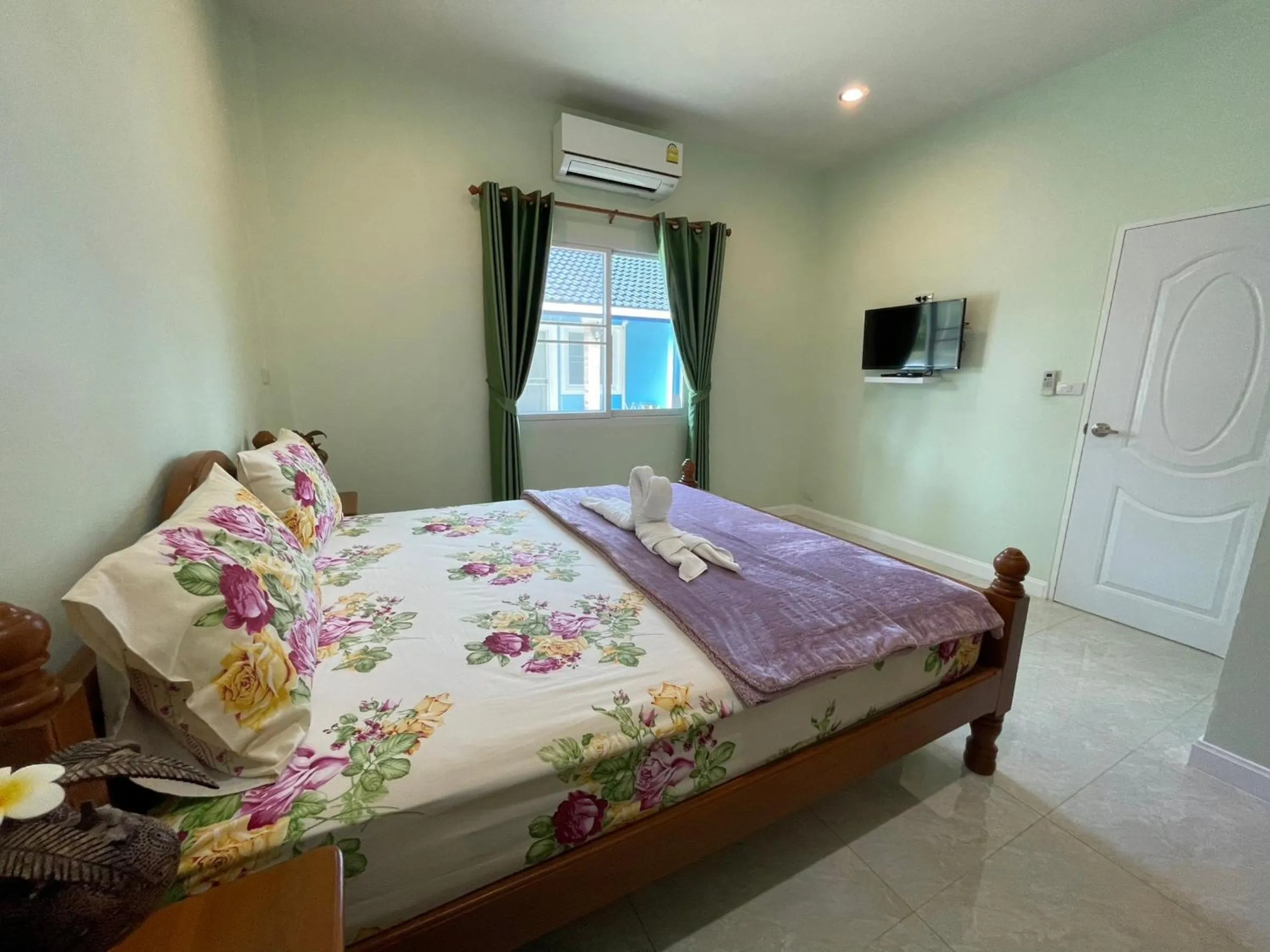 Bed in Blue Beach Bungalow