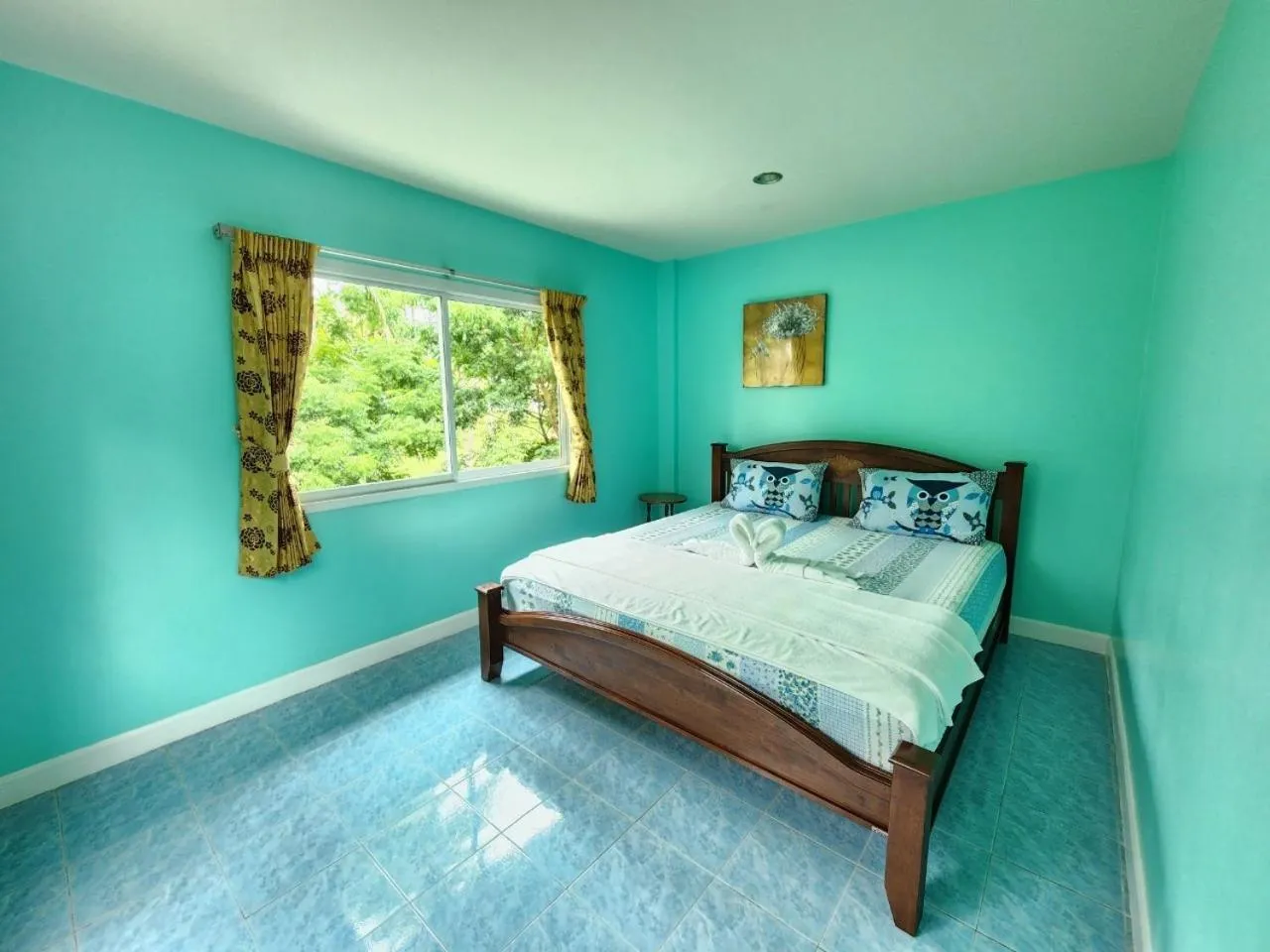 Bed in Blue Beach Bungalow