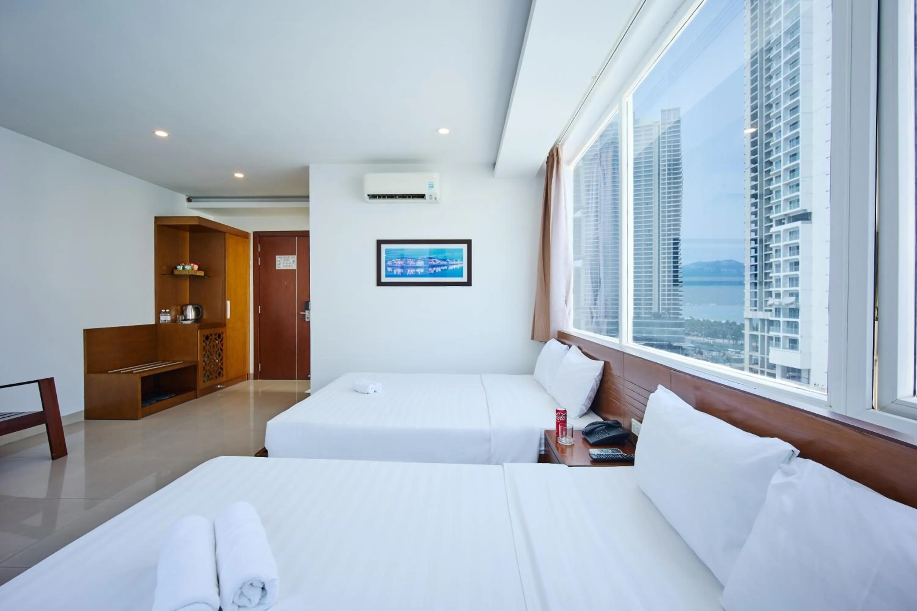 Bed in Golden Light Da Nang Hotel