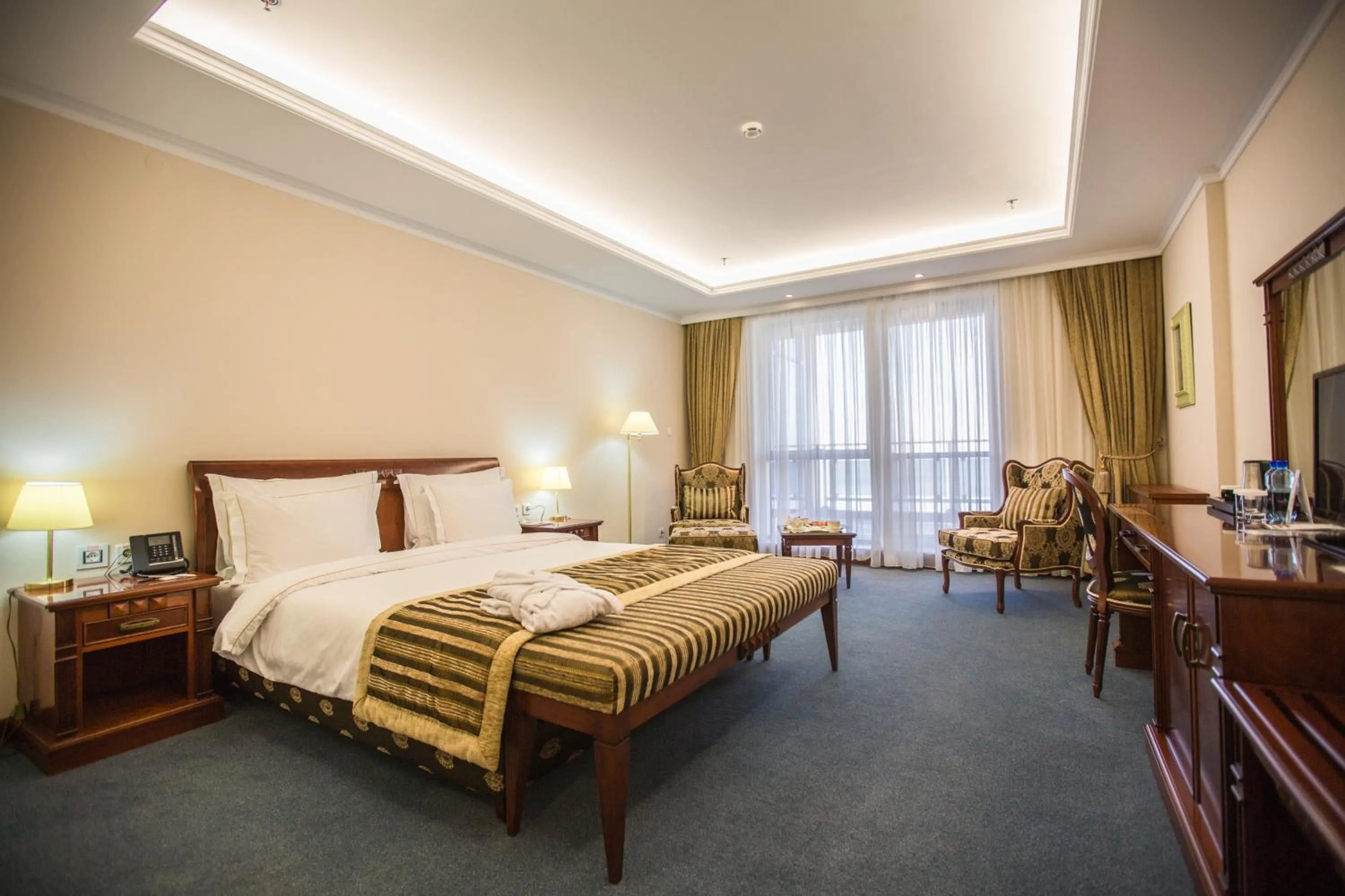 Bed in Caspian Riviera Grand Palace Hotel