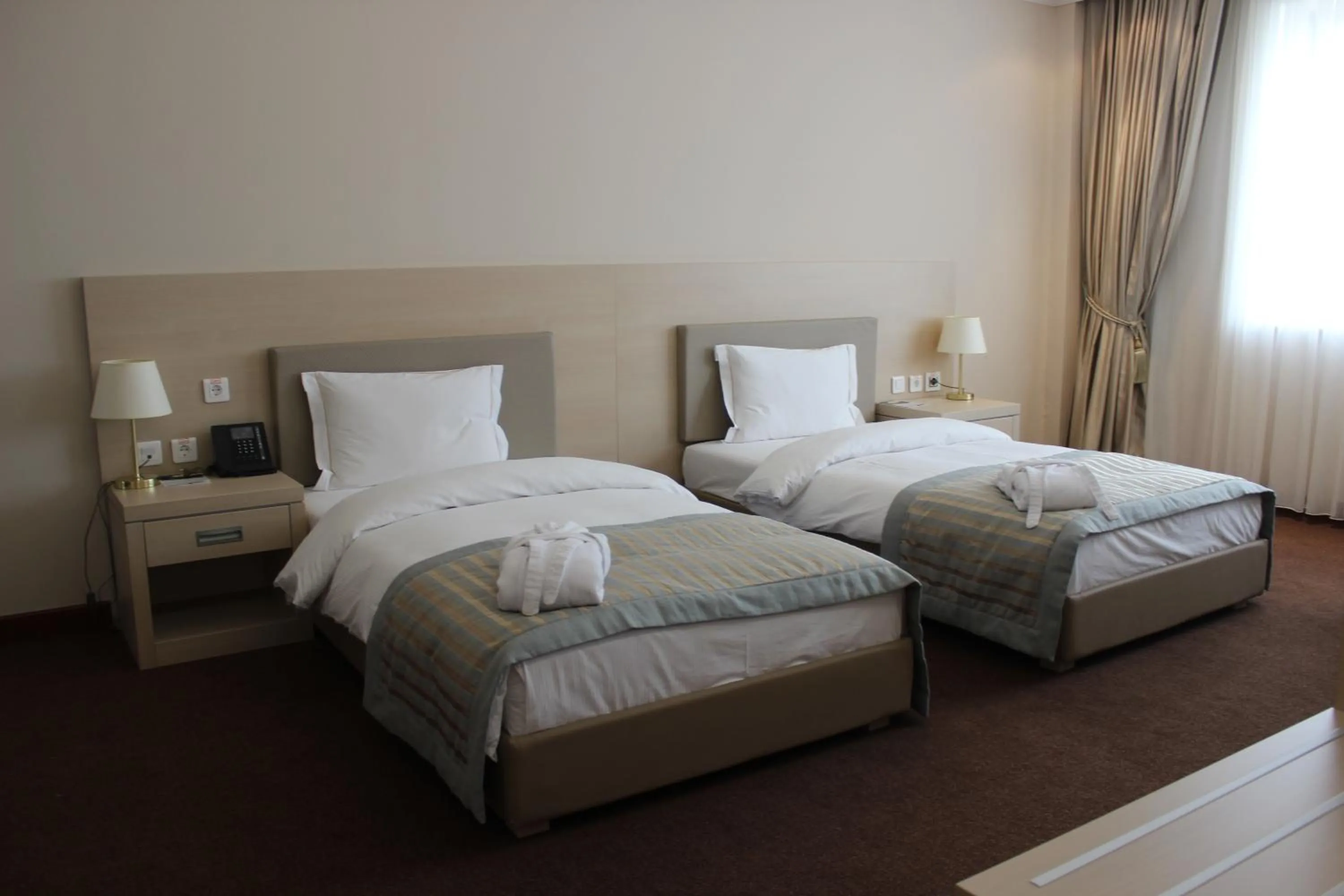Bed in Caspian Riviera Grand Palace Hotel