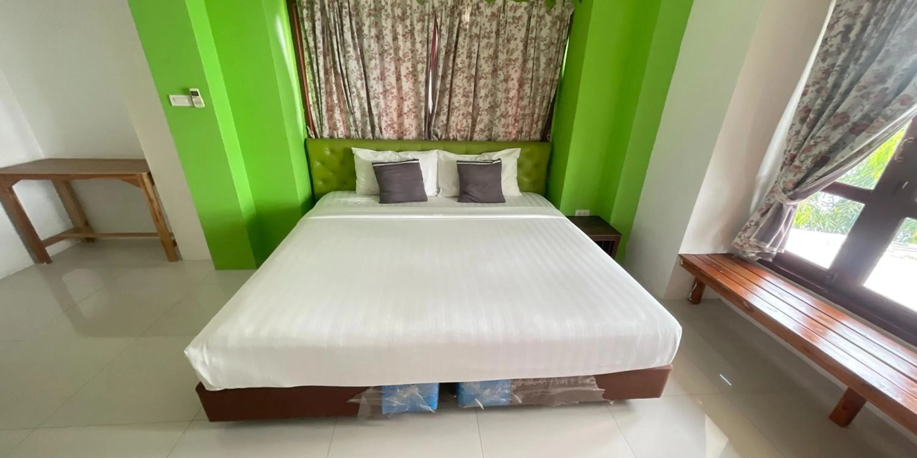 Bed in Yellow Tique Hotel