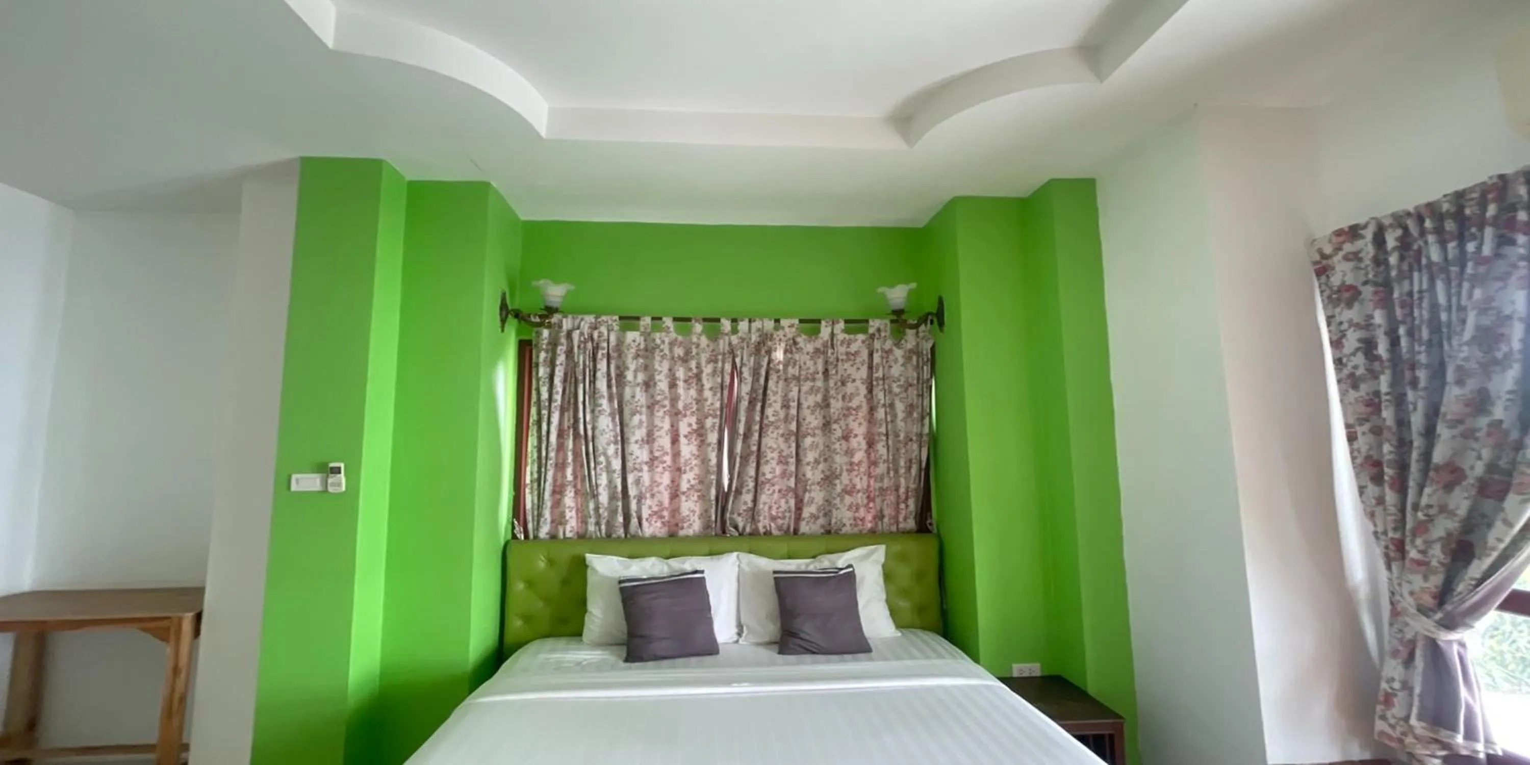 Bed in Yellow Tique Hotel