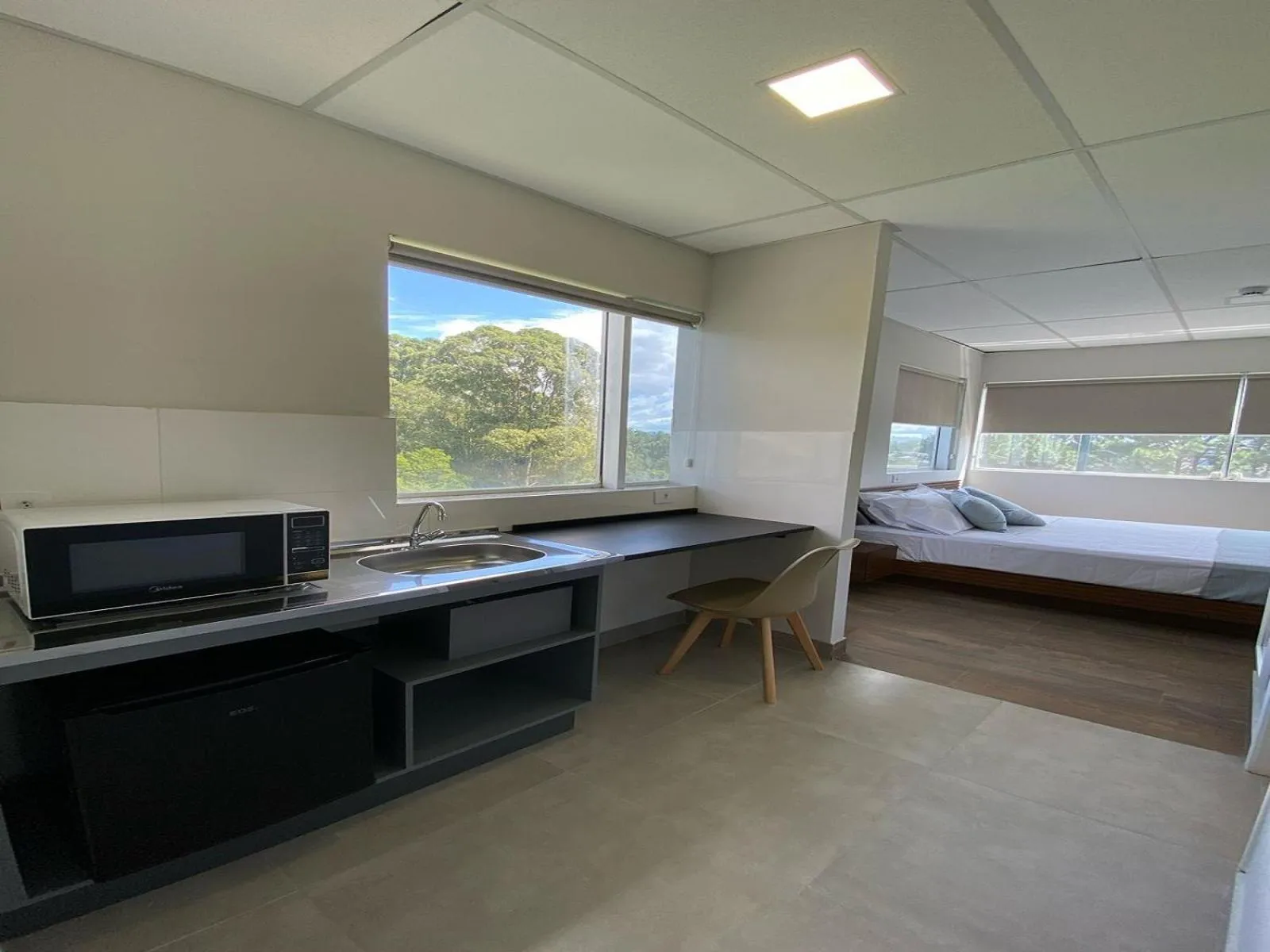 Kitchen or kitchenette, Bed in NOBRE HOTEL COTIA