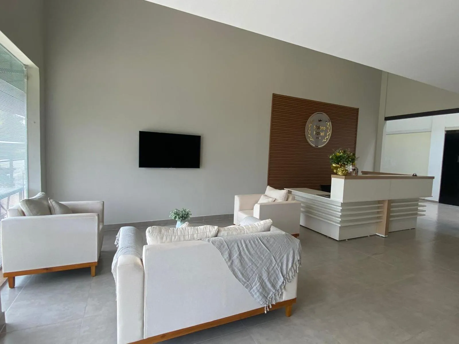 Communal lounge/ TV room in NOBRE HOTEL COTIA