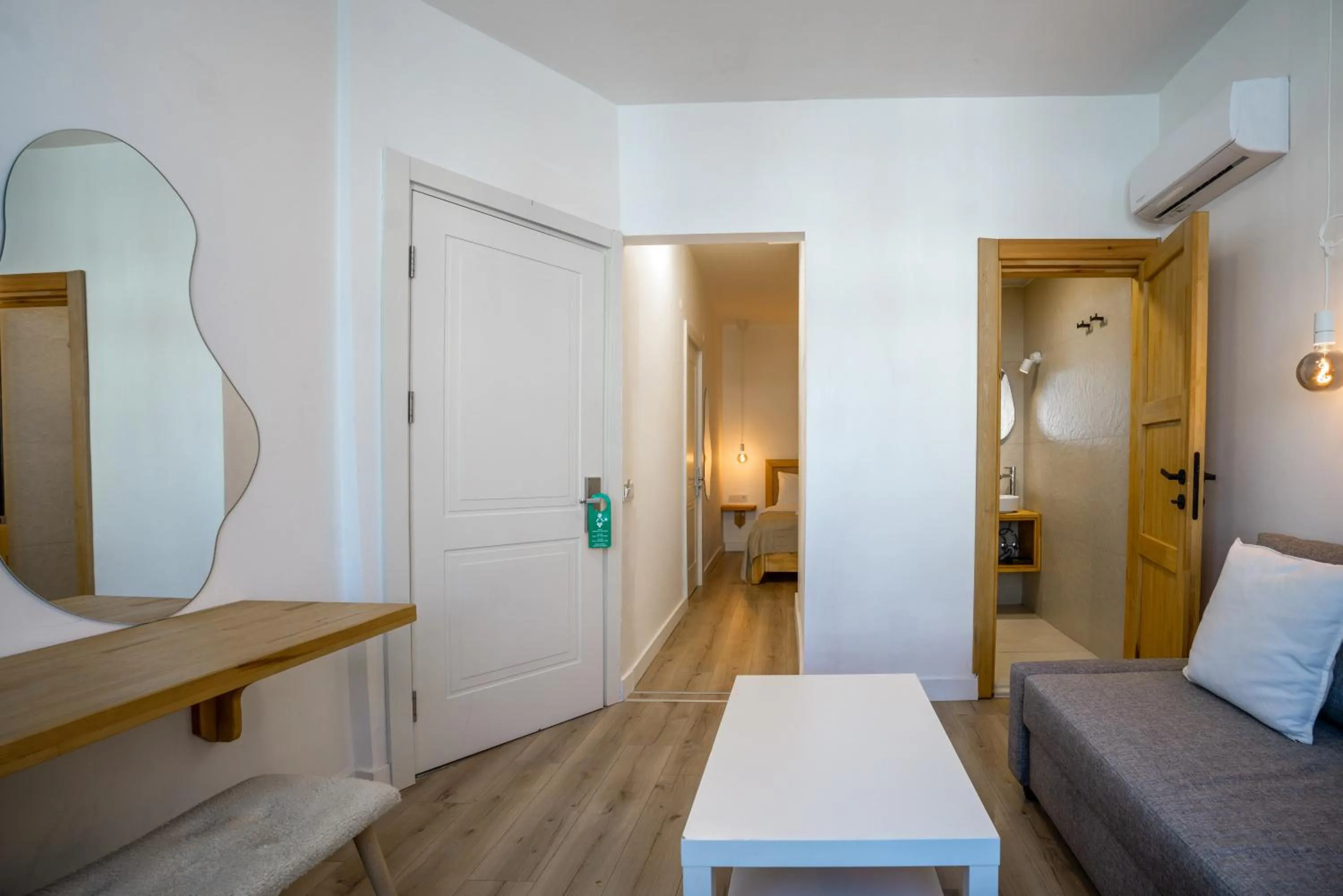 Seating area, Bed in Audo Local